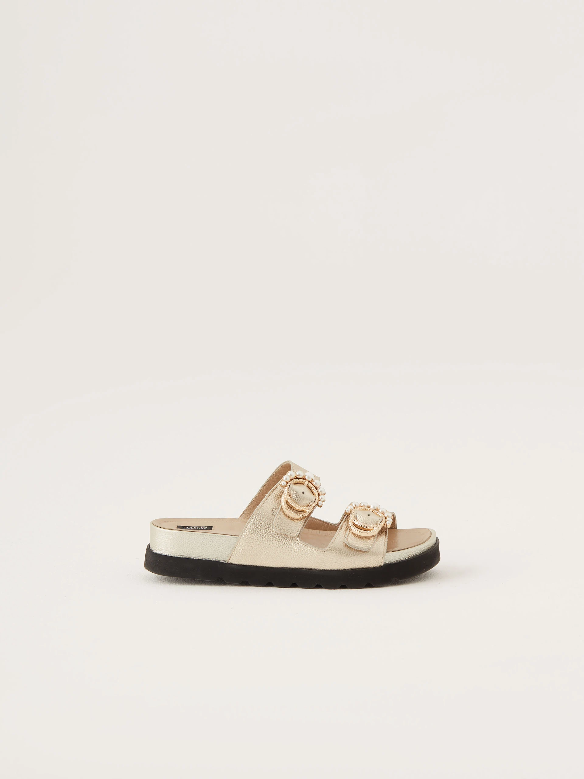 Flip-flops with decorative buckles in gold color