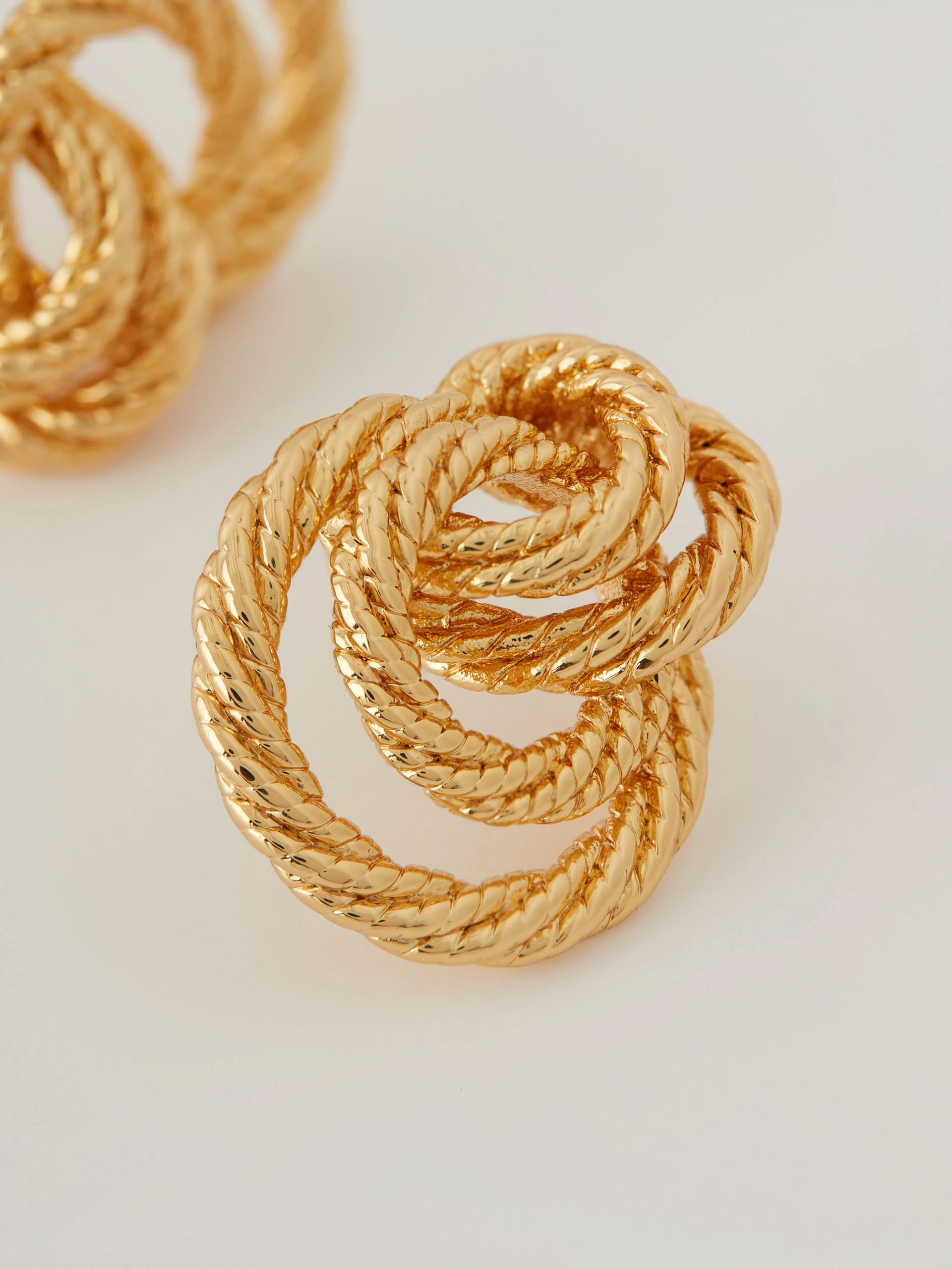 Gold-colored earrings