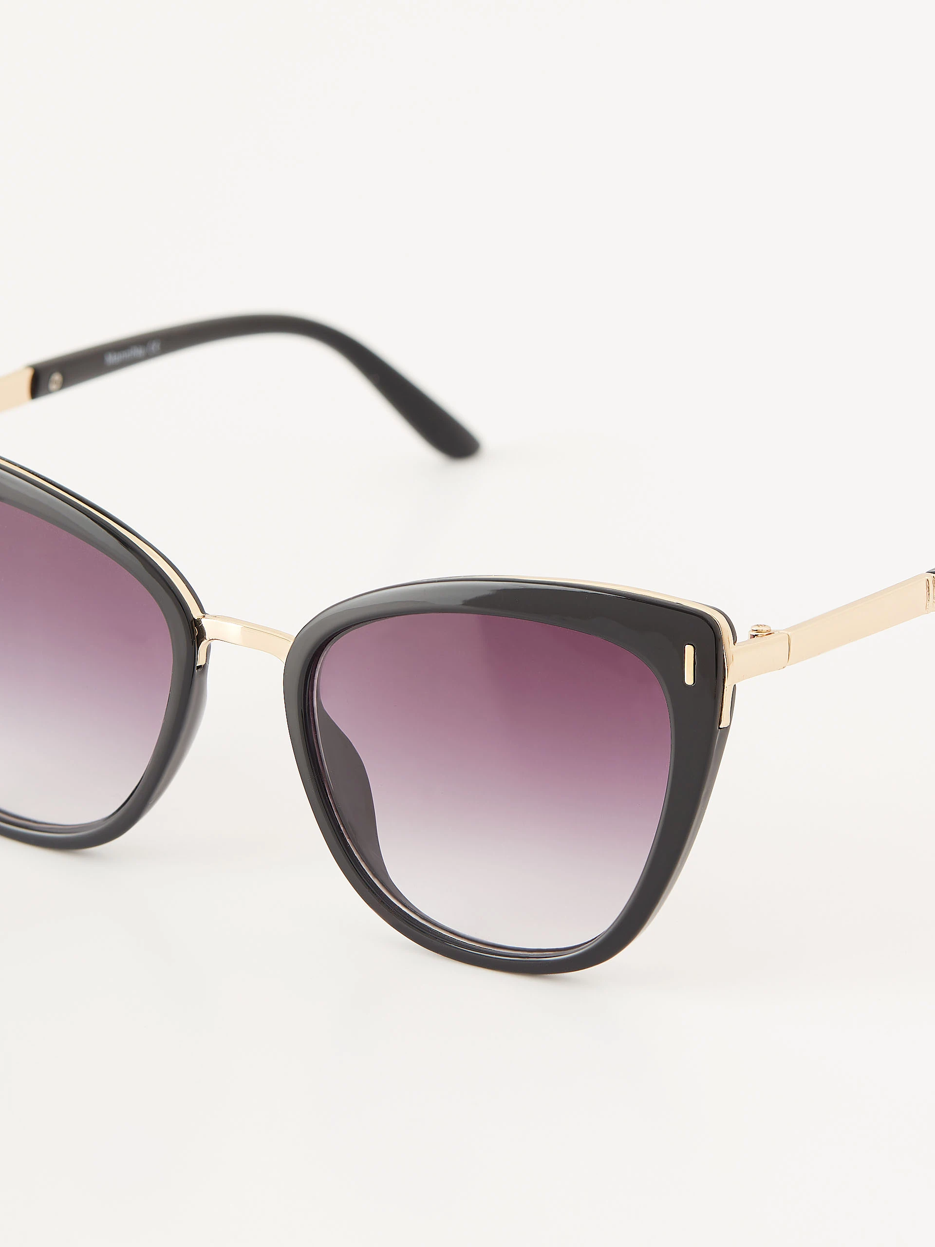 Black sunglasses in the shape of cat's eyes