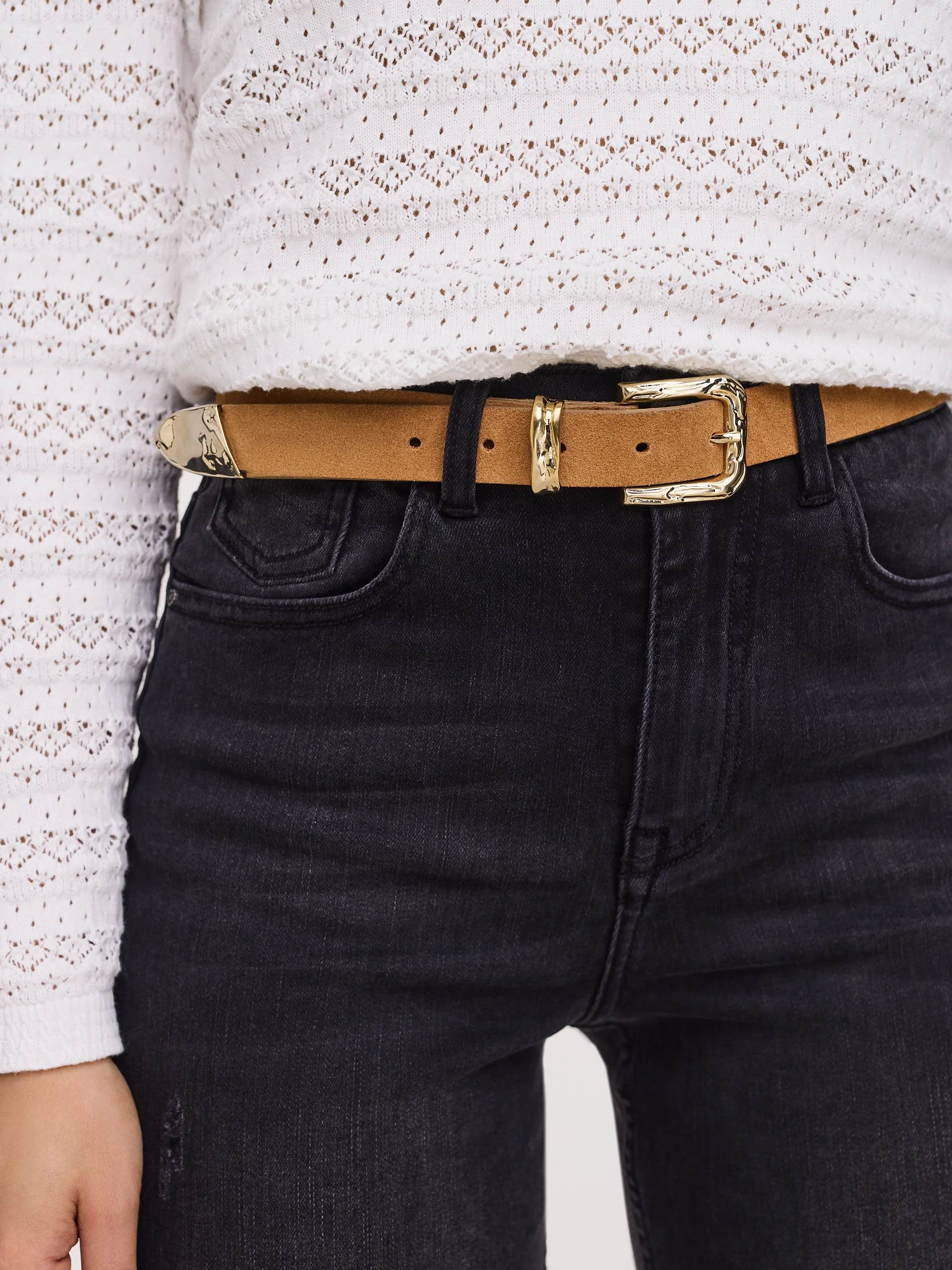 Brown leather belt with decorative buckle