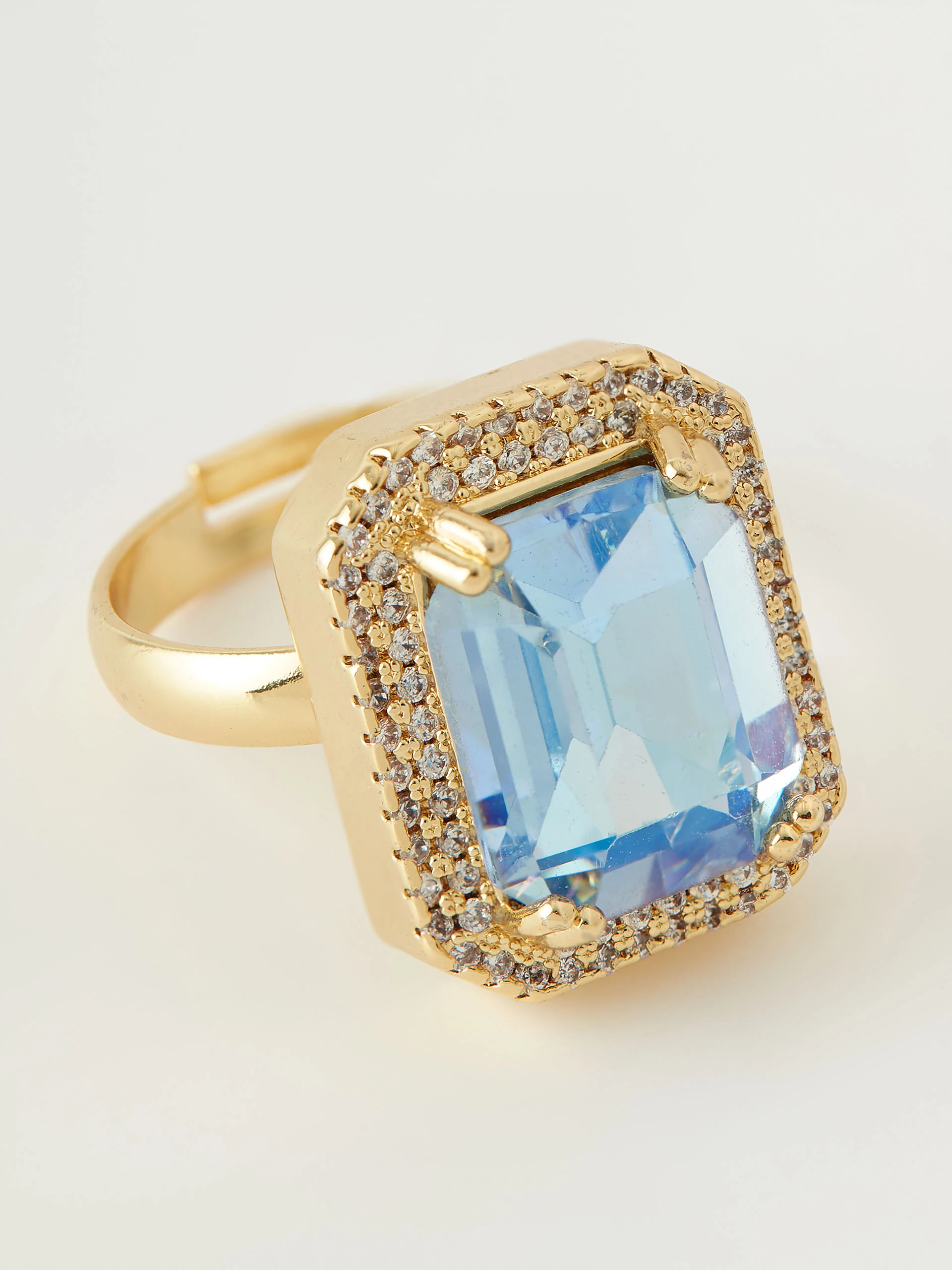 Ring with blue crystal