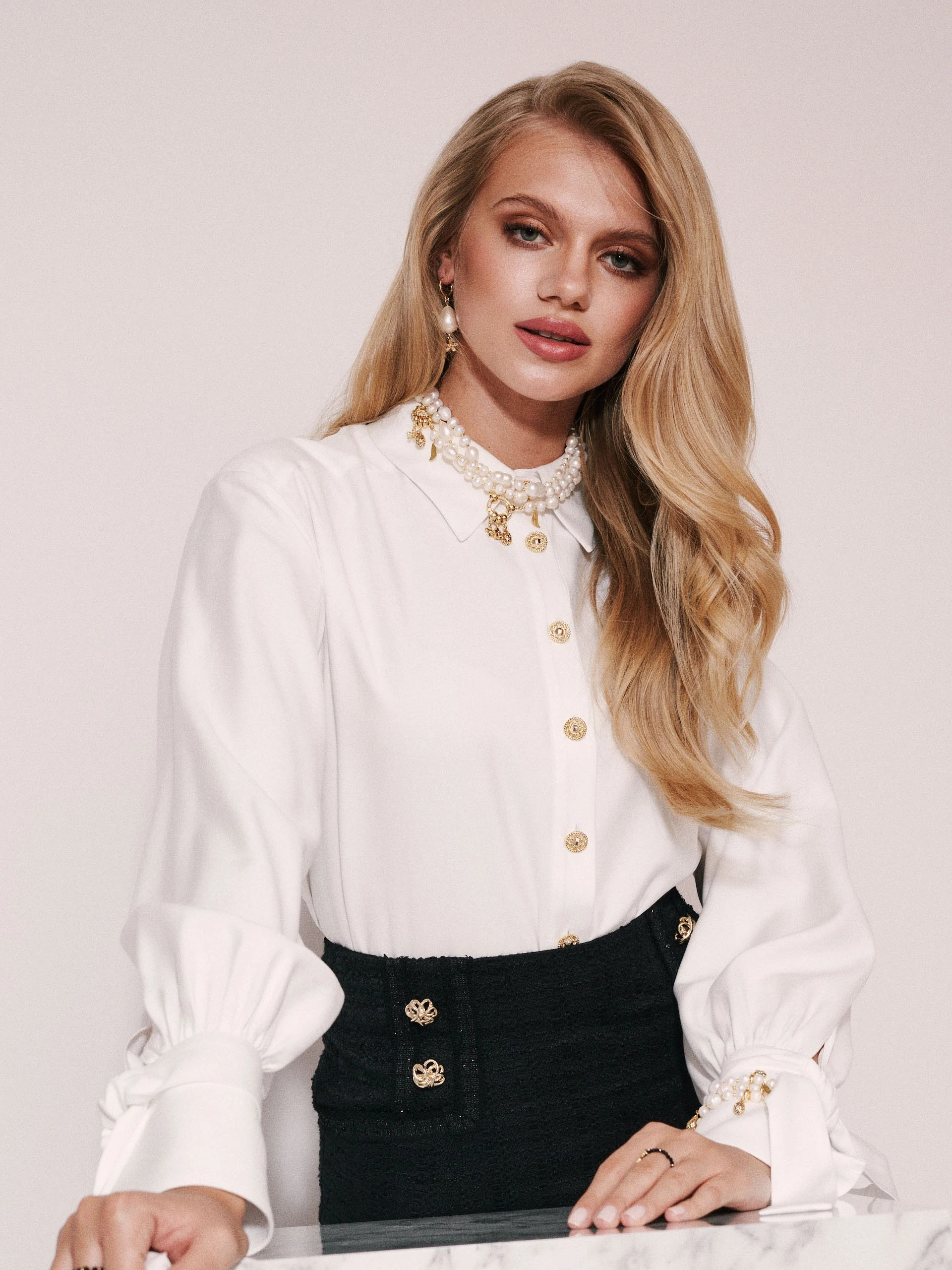 White shirt with jeweled buttons