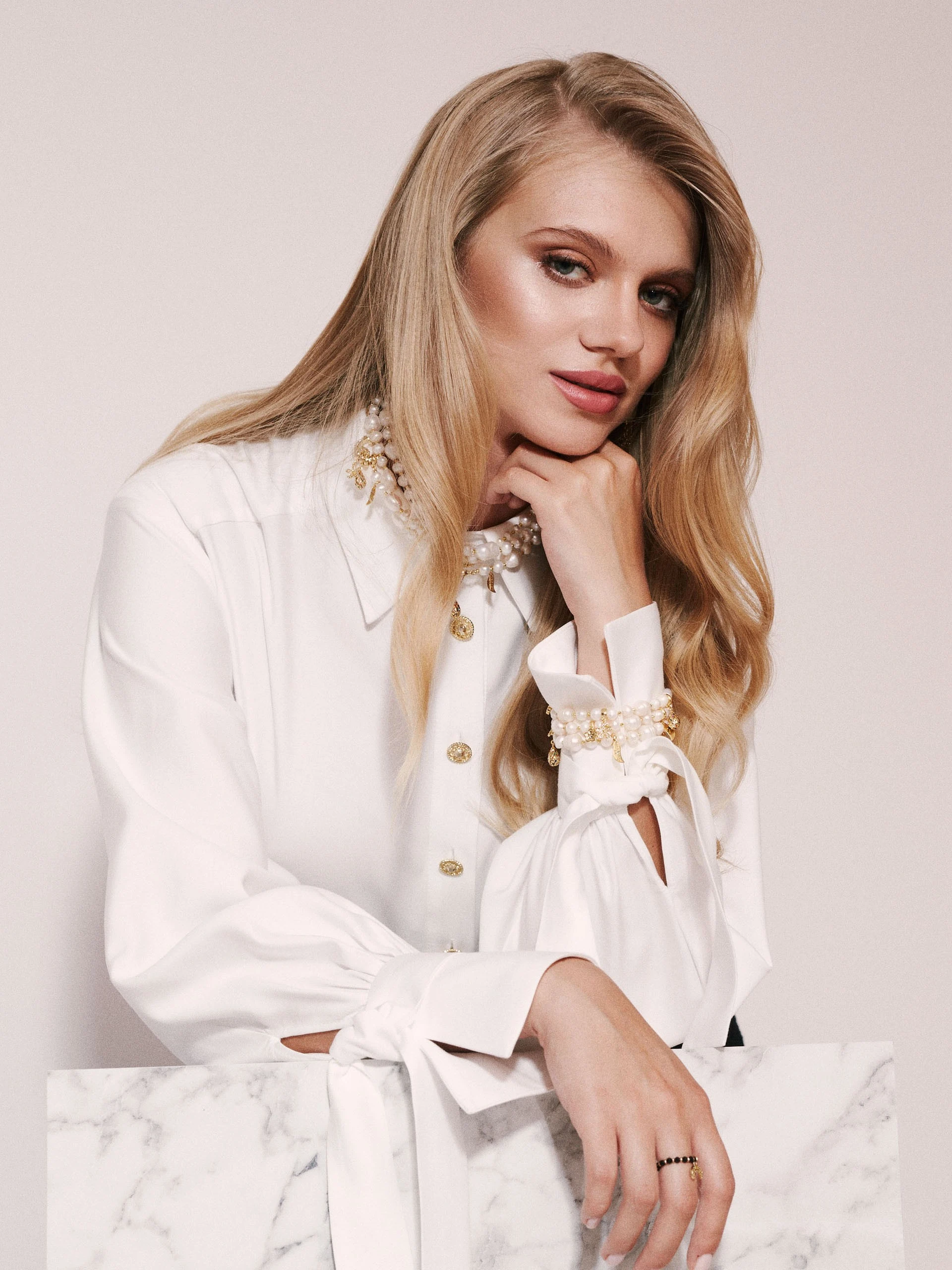 White shirt with jeweled buttons