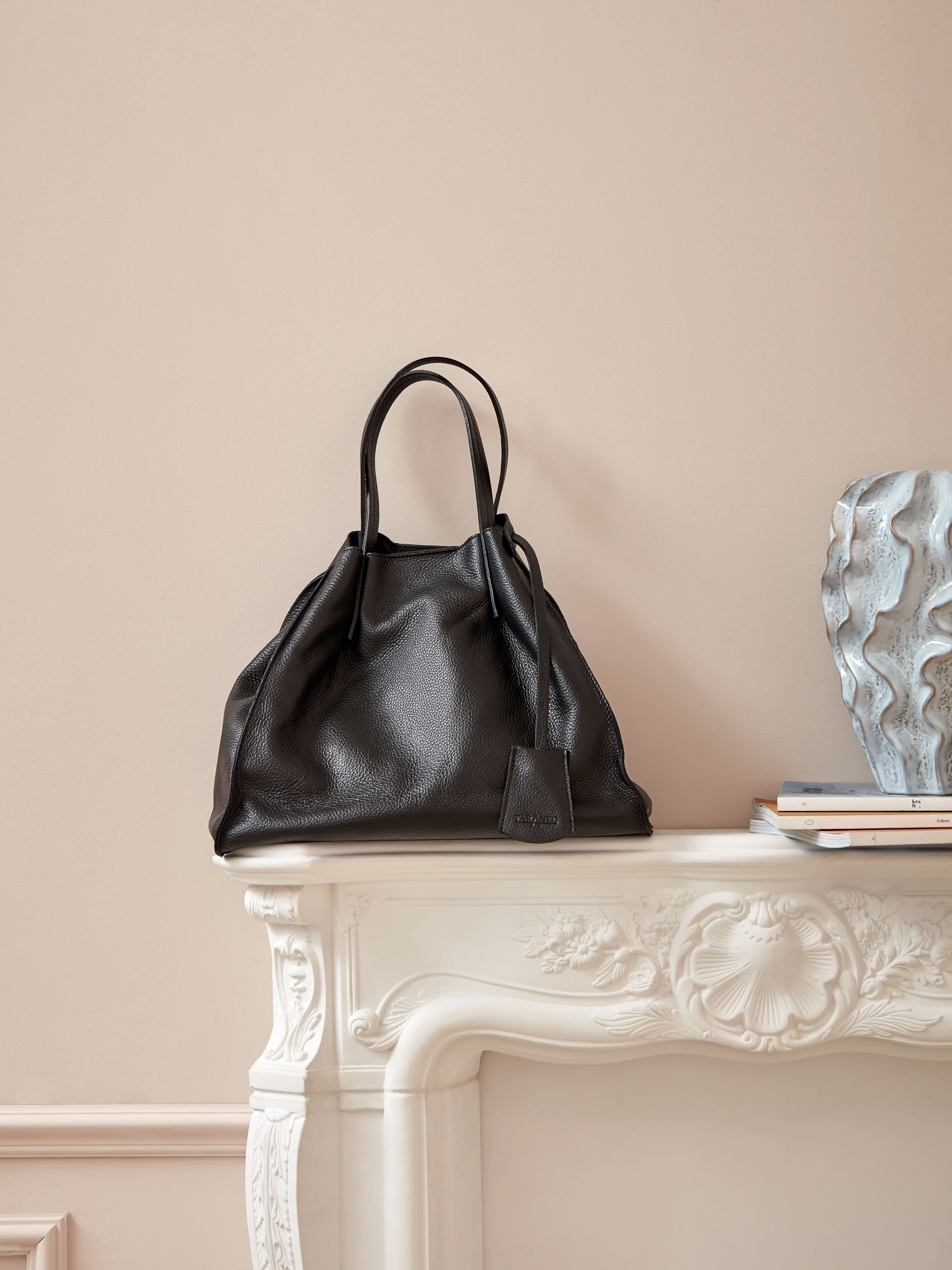 CAPACIOUS LEATHER HANDBAG