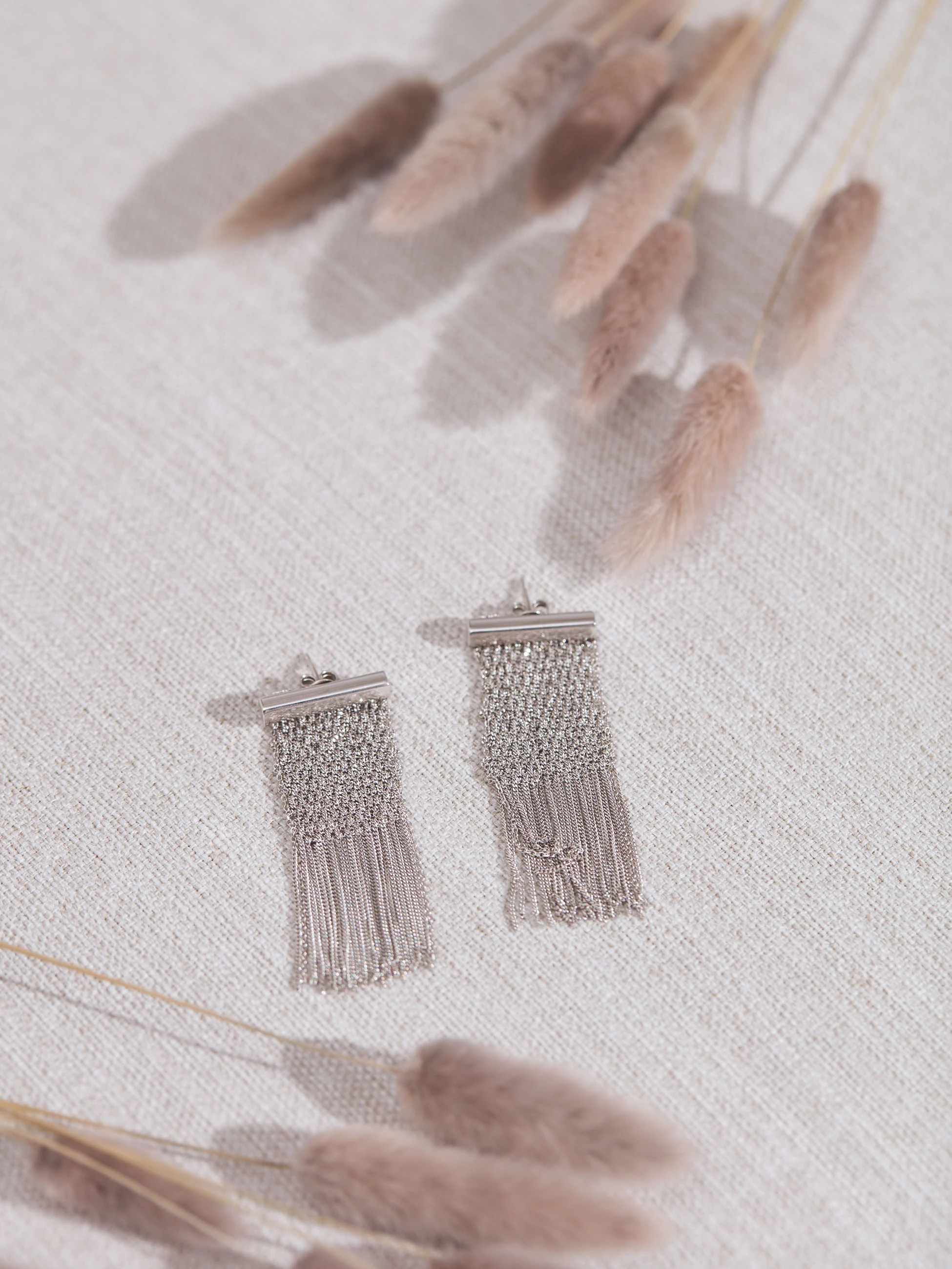 WIDE BRAIDED EARRINGS