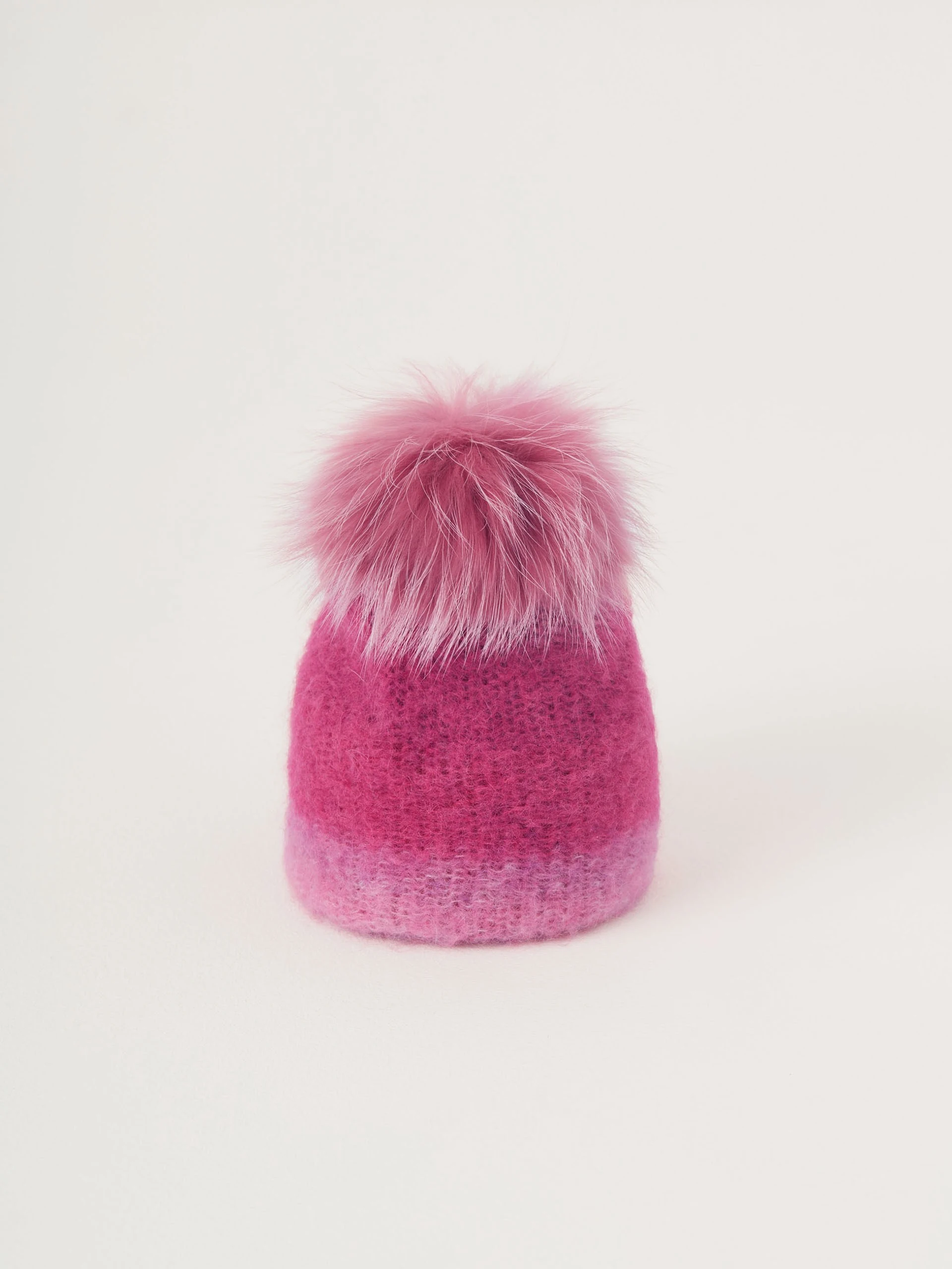 Pink beanie with pom-pom