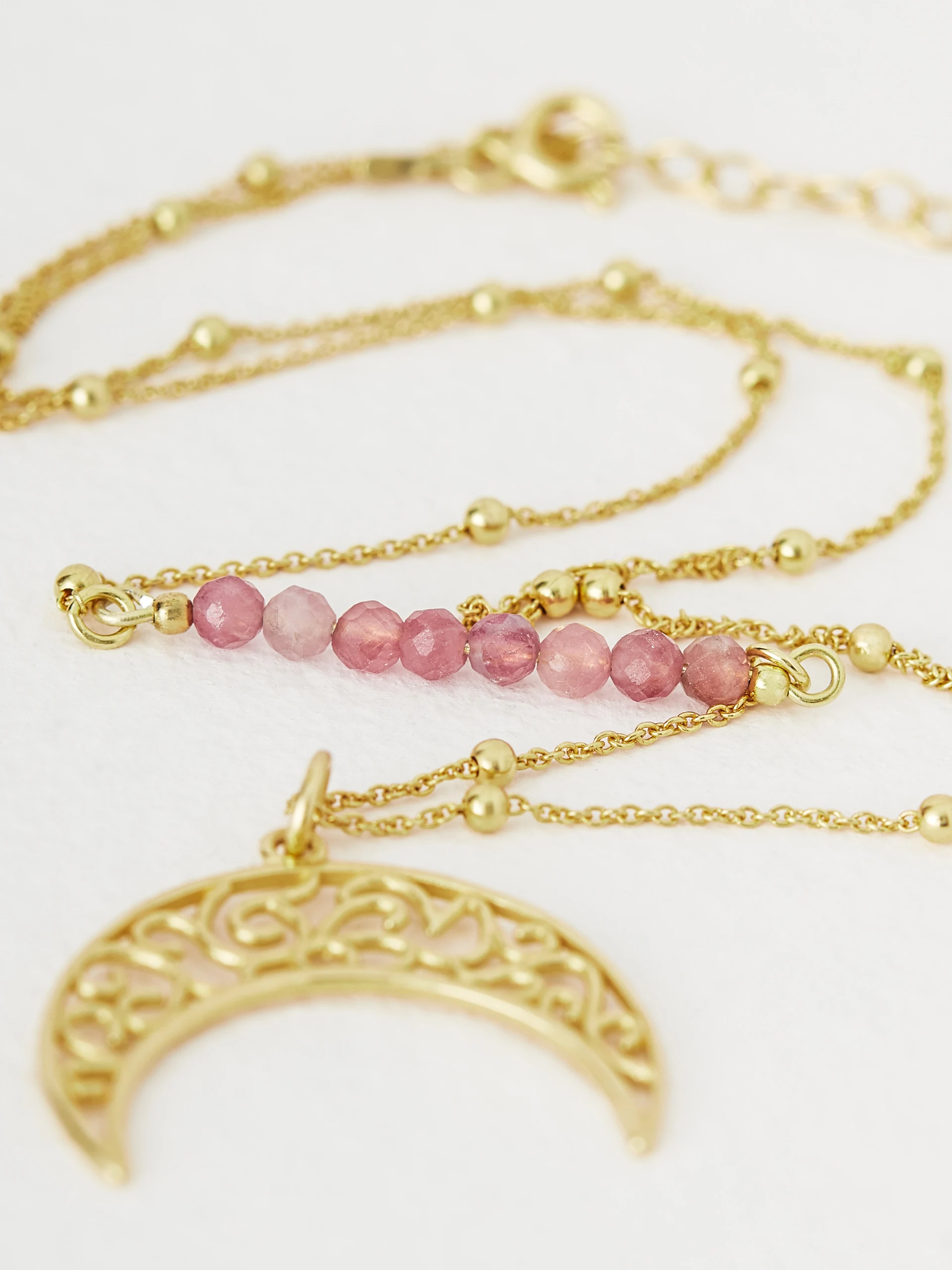 Necklace with openwork crescent moon