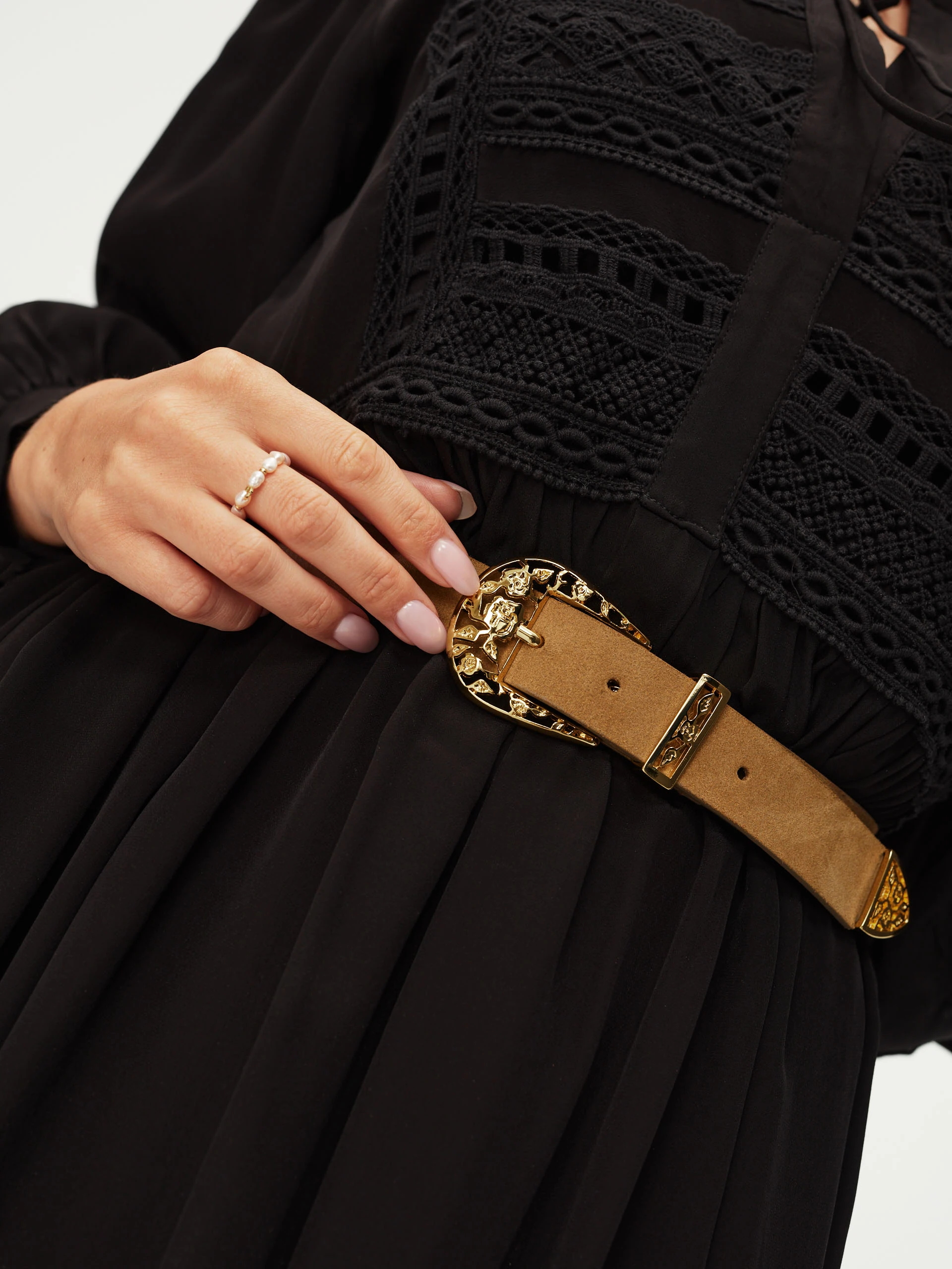 Brown belt with decorative buckle