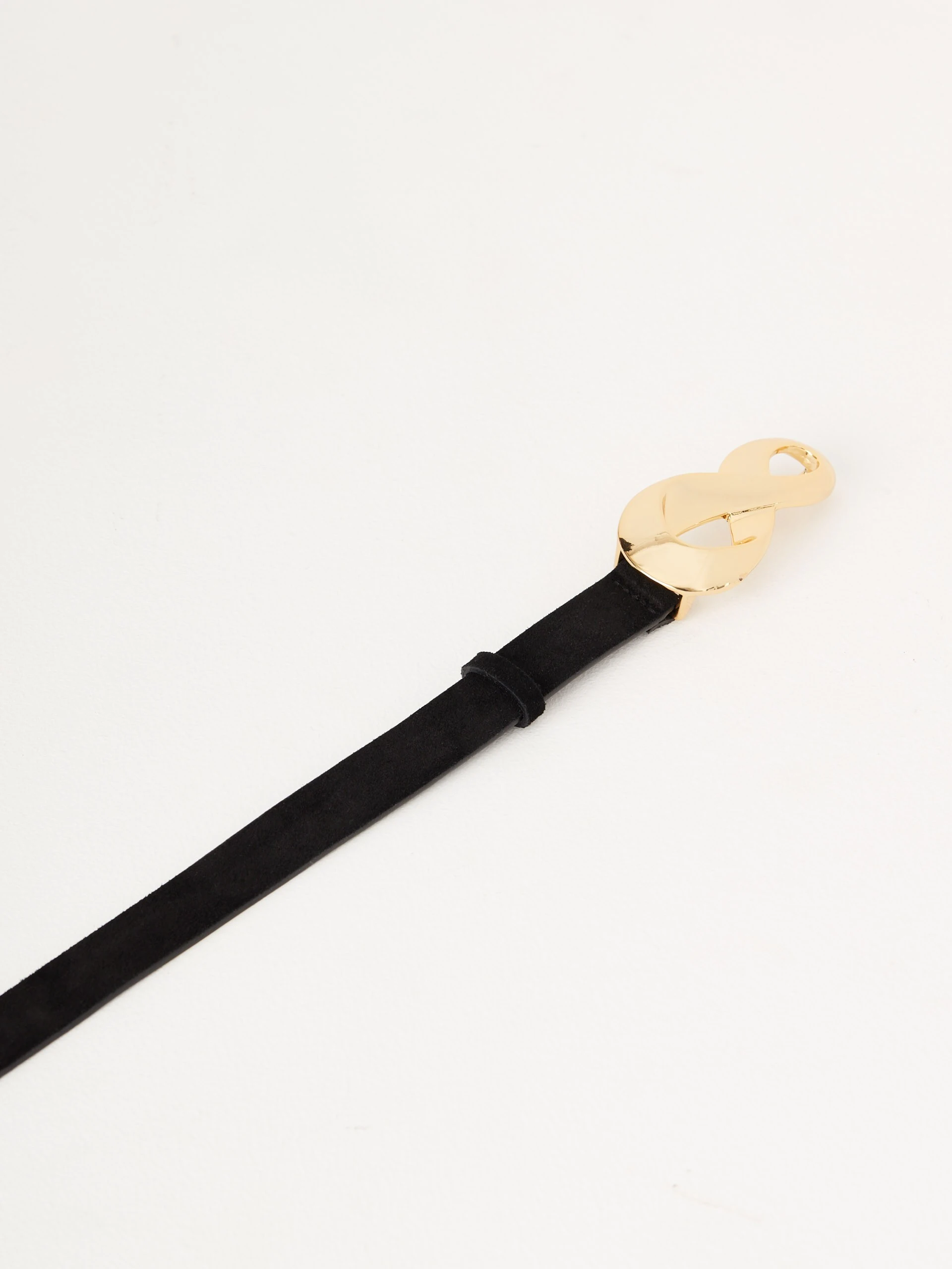 Thin leather belt with decorative buckle