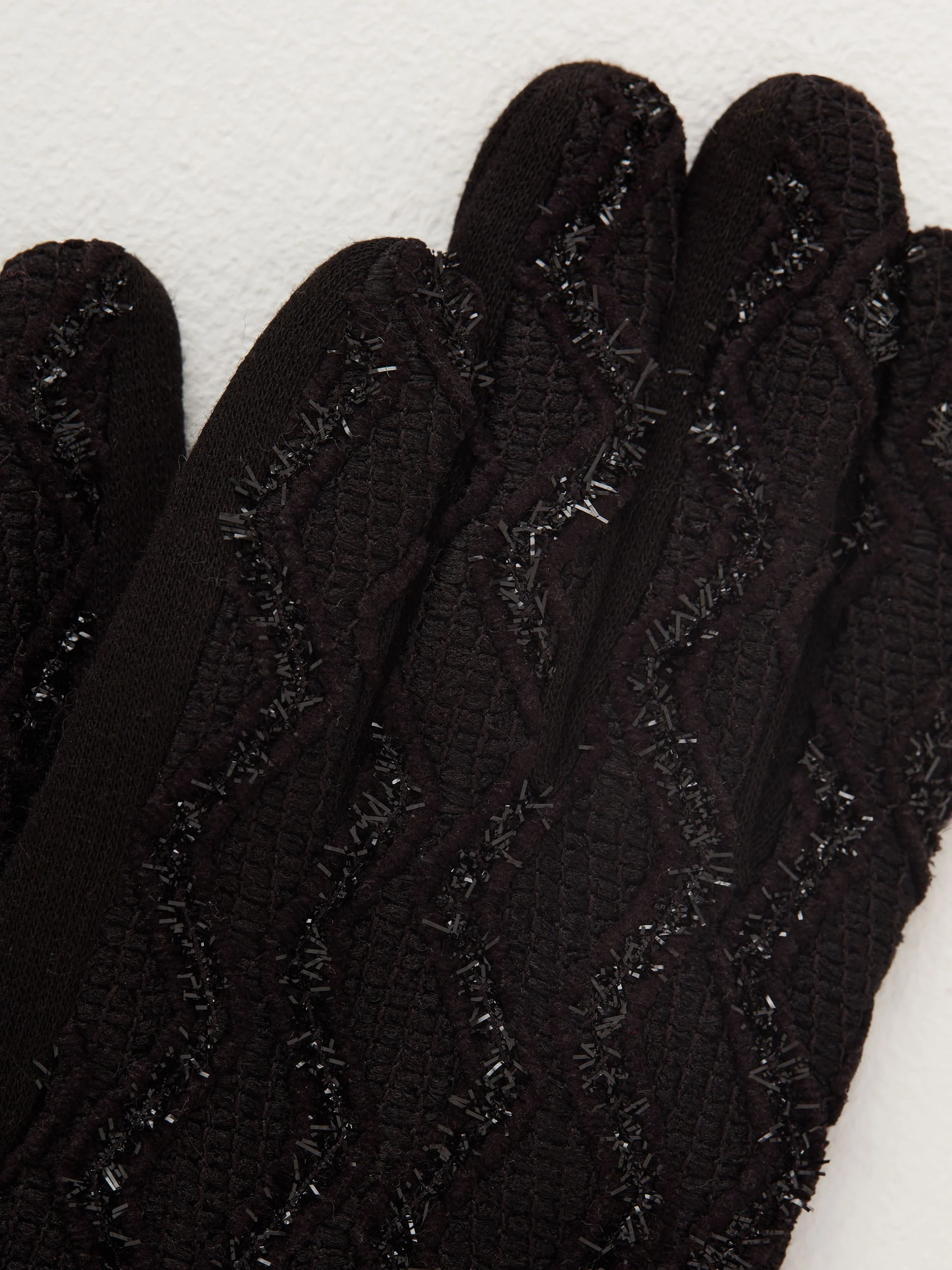 Knitted black gloves