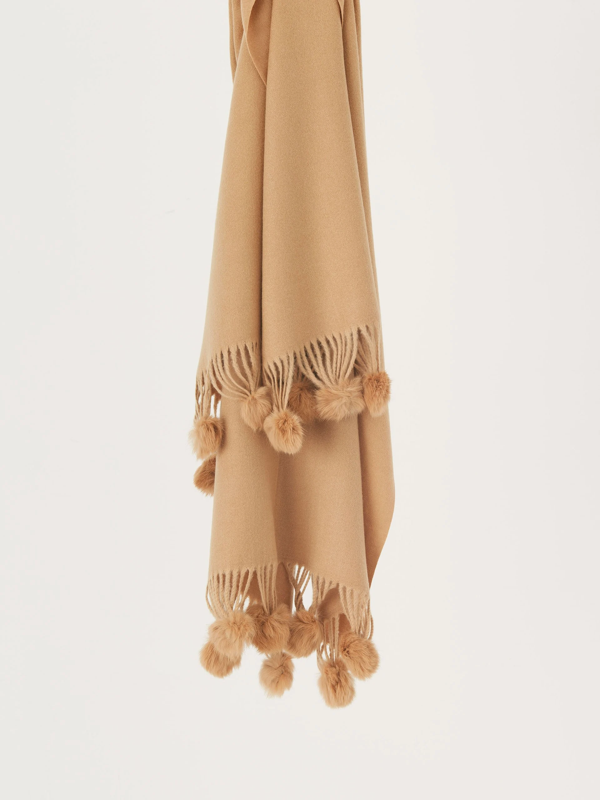 Beige shawl with pom-poms