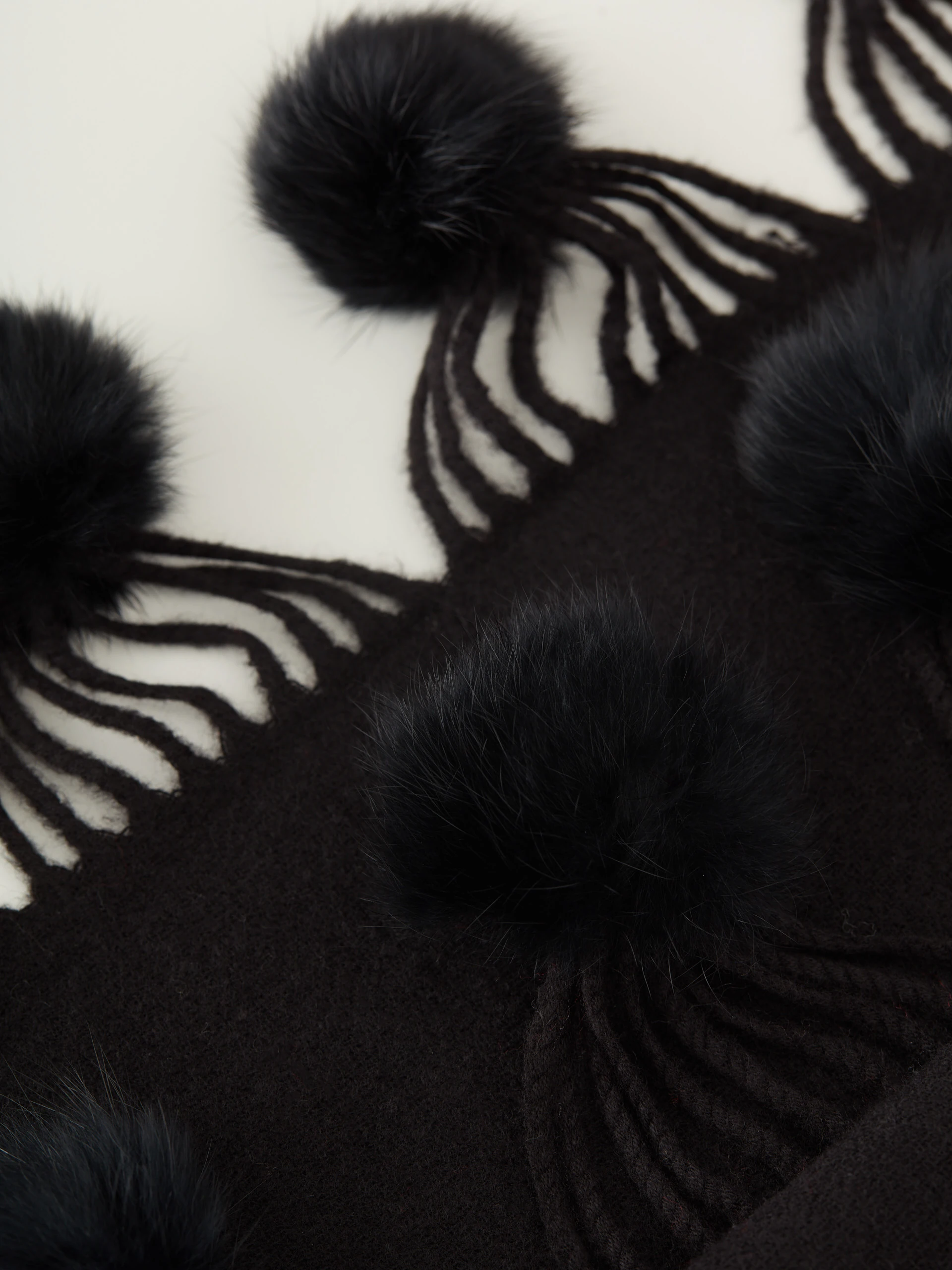 Black scarf with pompoms