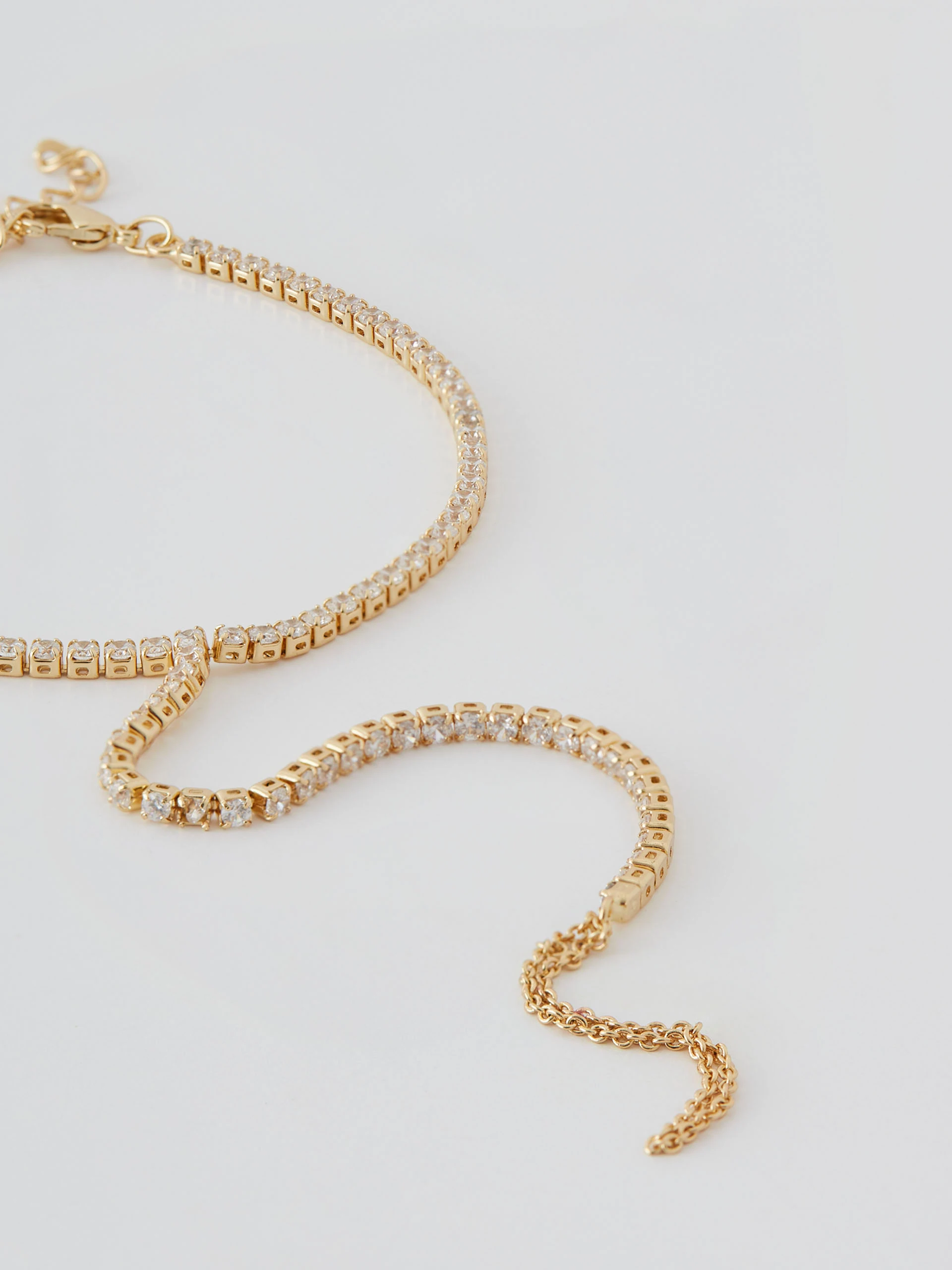 Bracelet with ring in gold color
