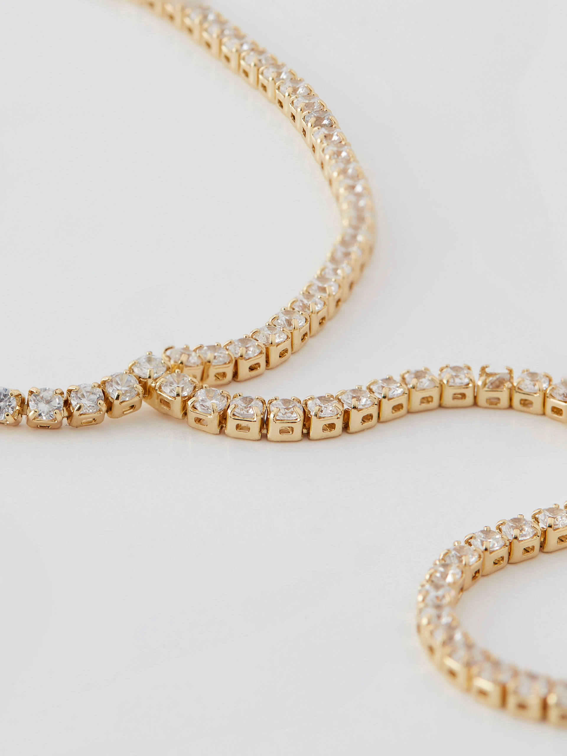 Bracelet with ring in gold color