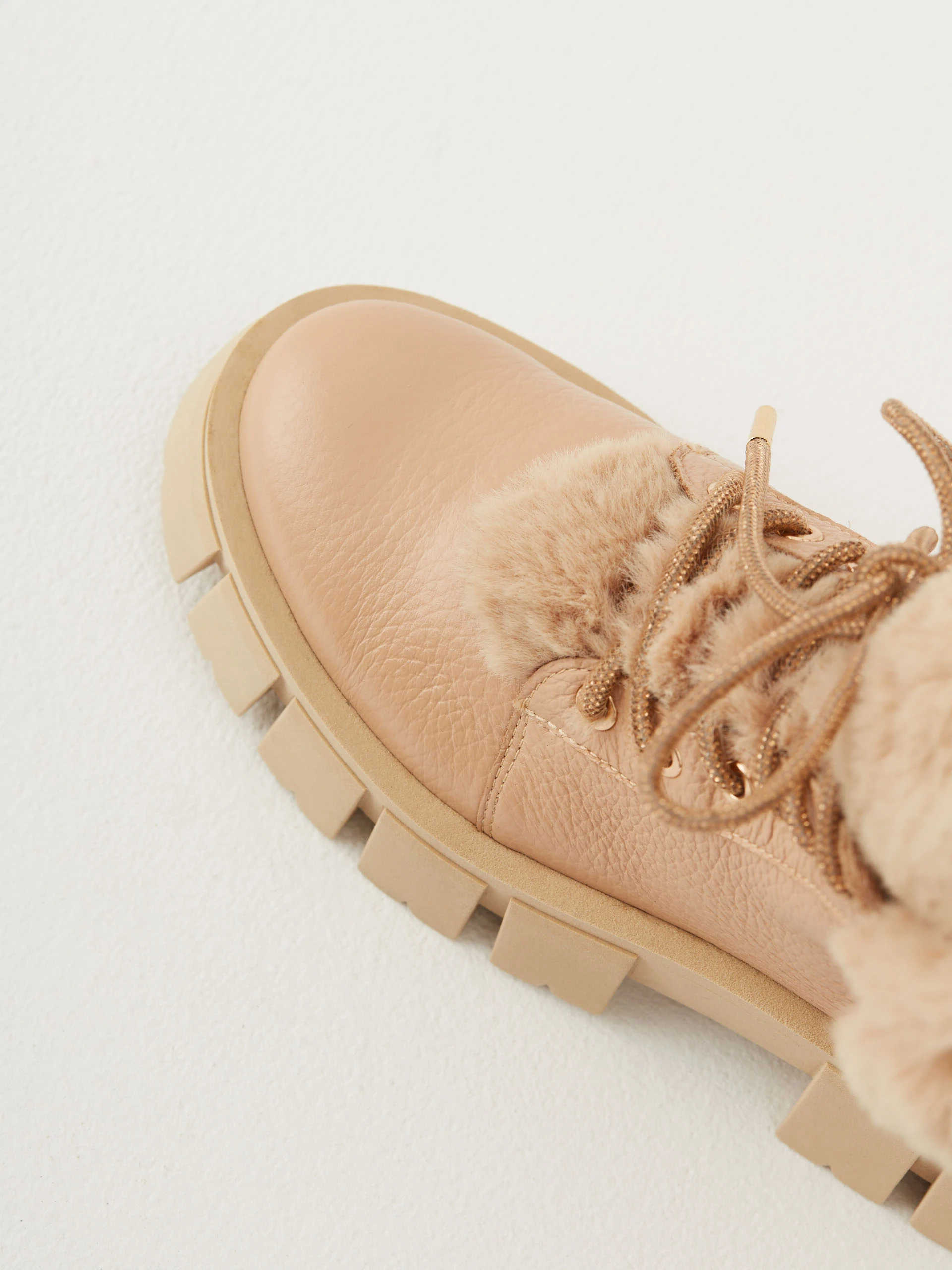 Warmed leather boots