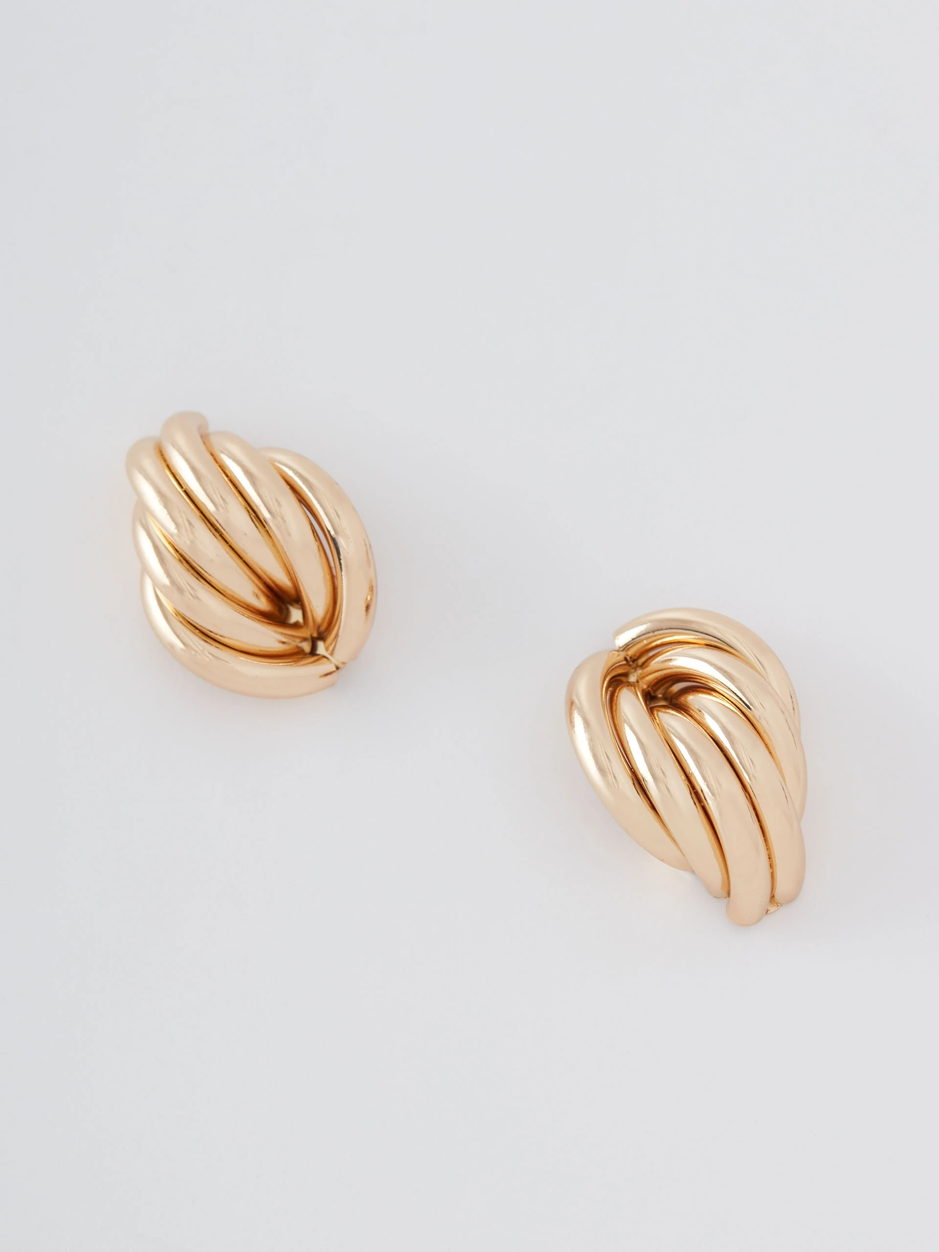 Gold fluted metal earrings