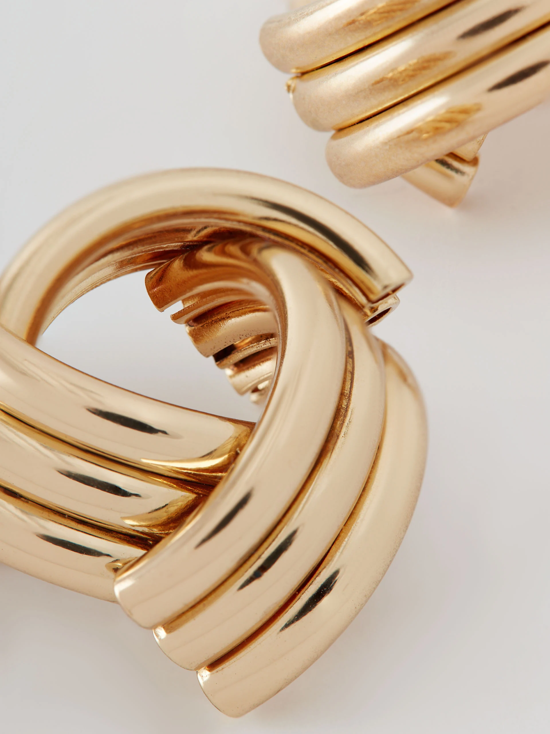 Gold-colored earrings