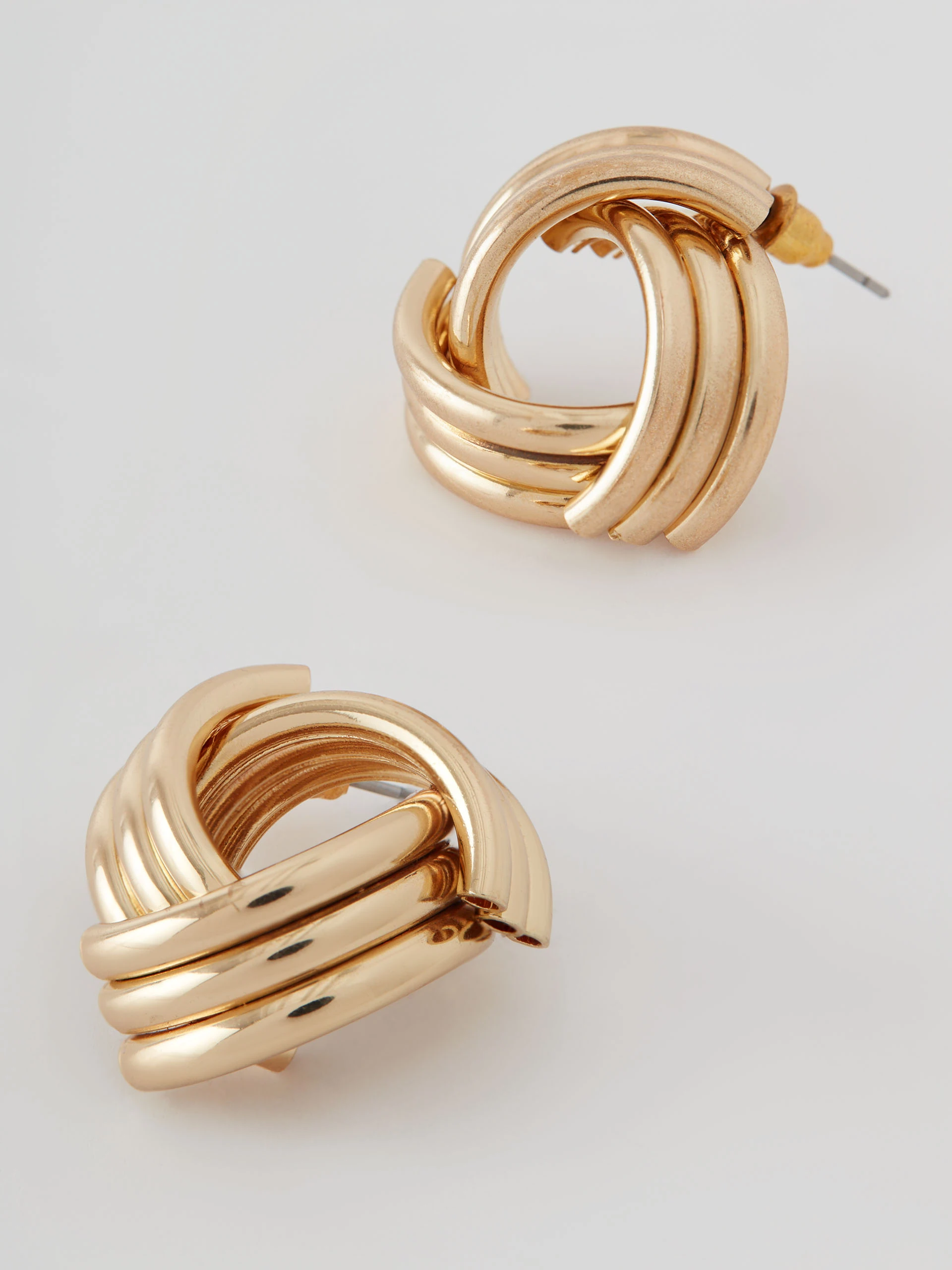 Gold-colored earrings