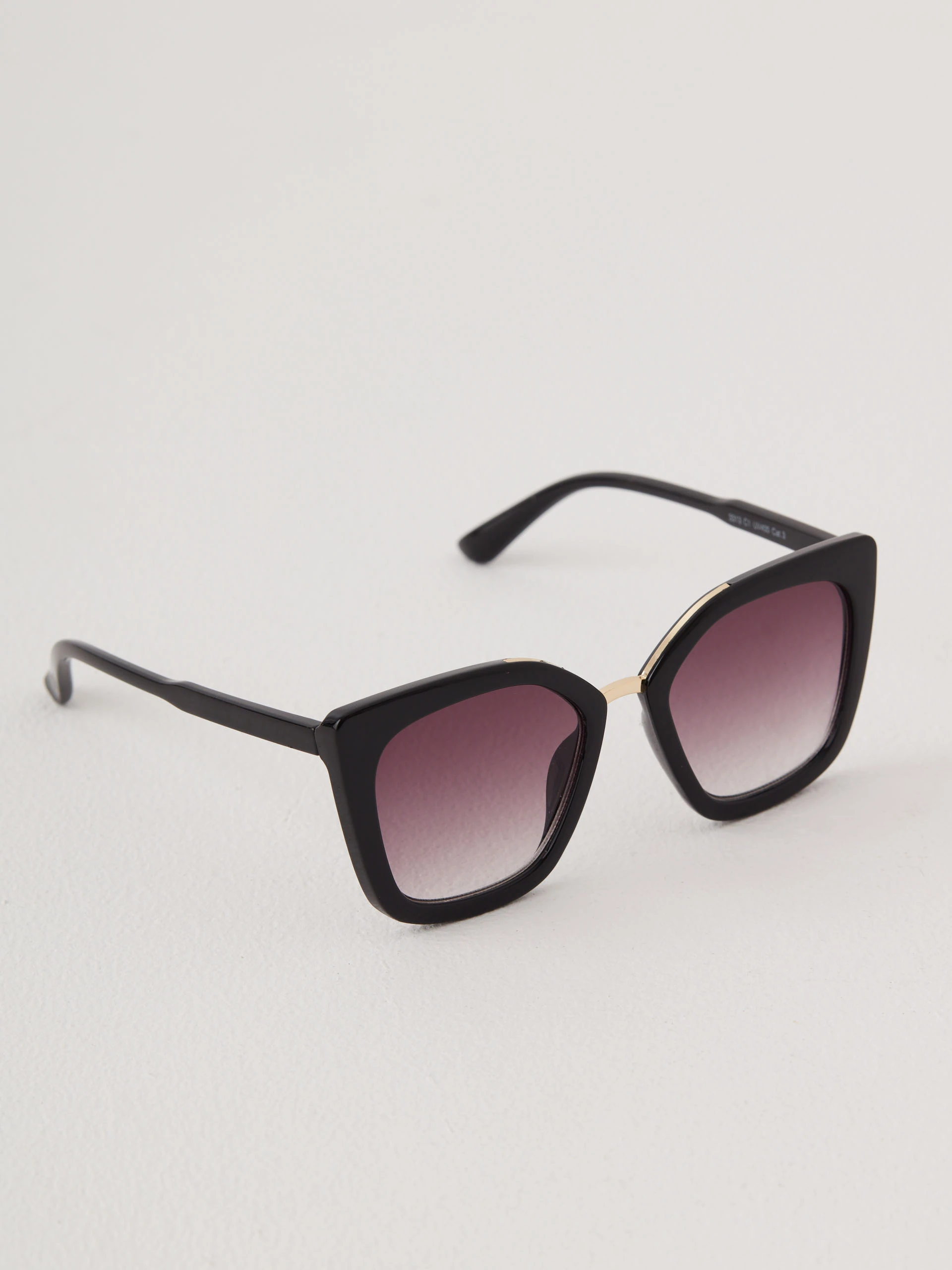 Black sunglasses with decorative inserts
