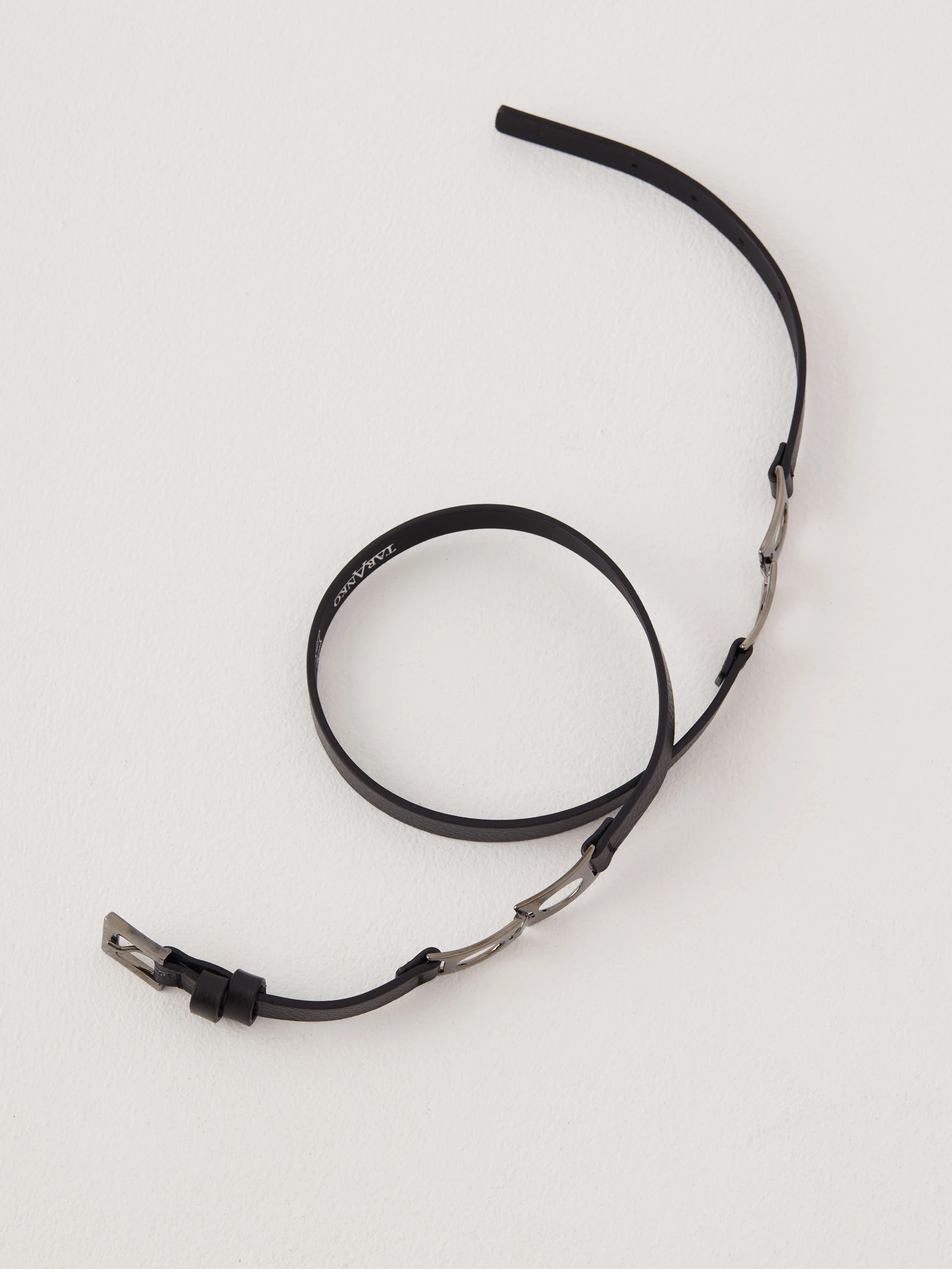 Black belt with gold decorative buckles