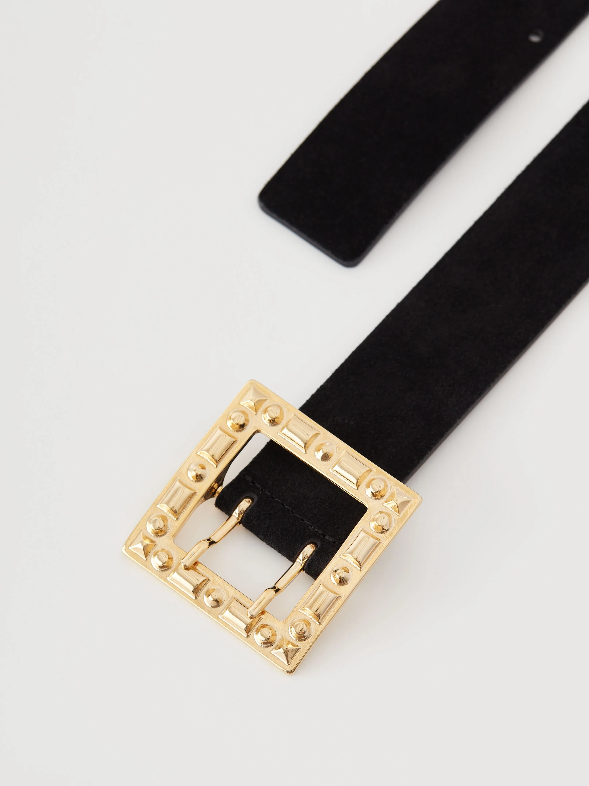 Black belt with decorative buckle