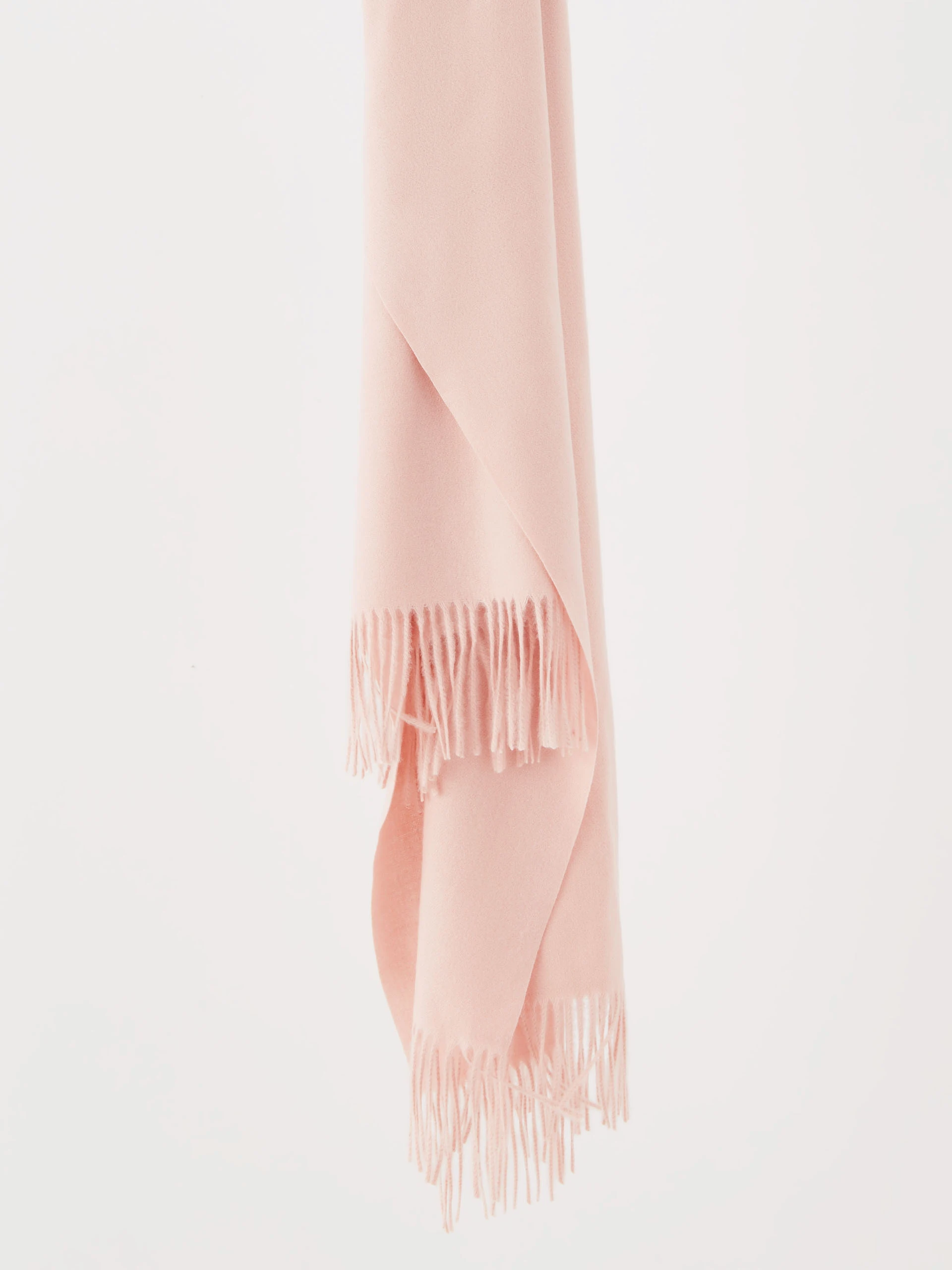 Pink knitted shawl with tassels