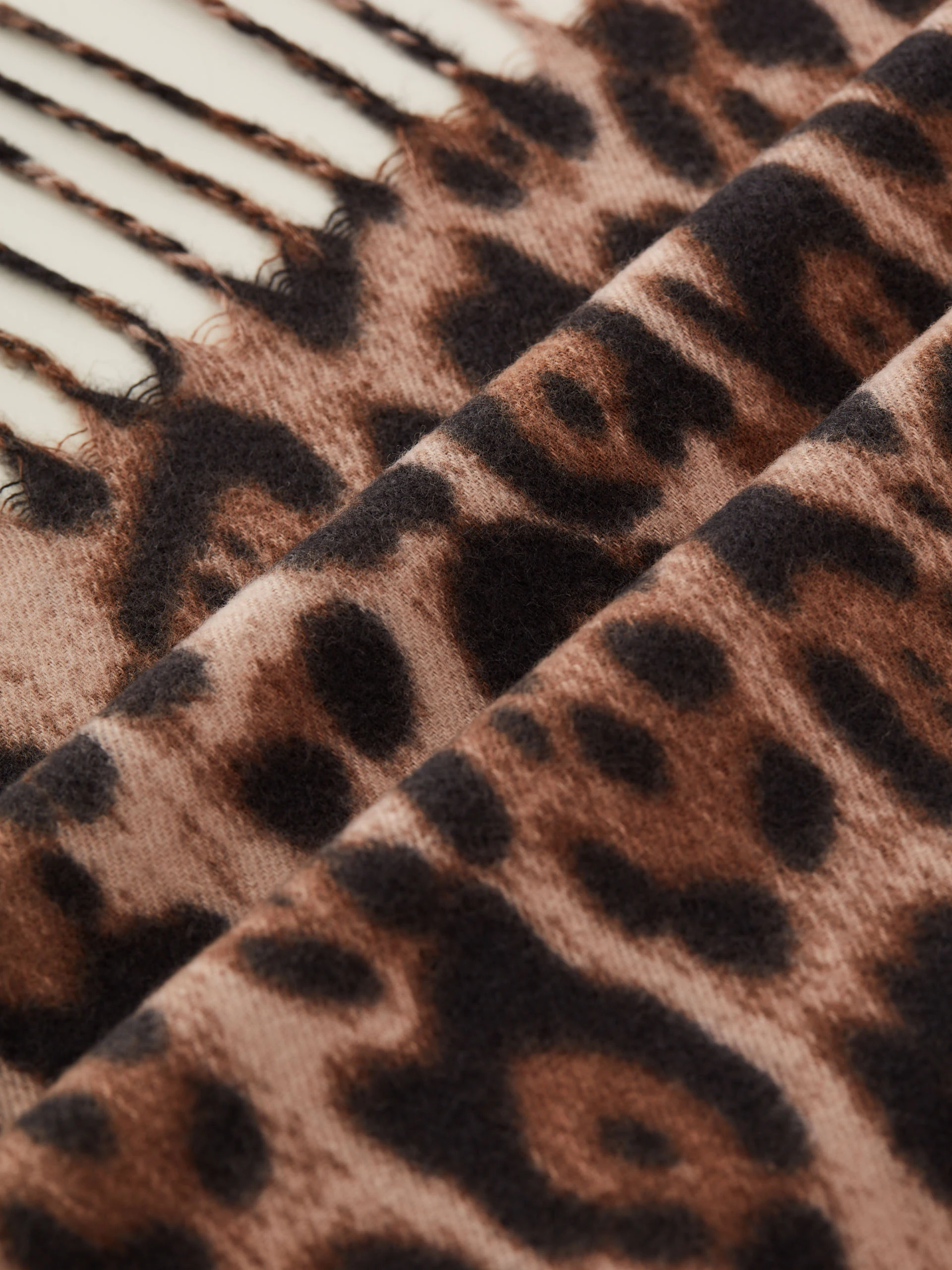 Knitted large shawl with animal pattern