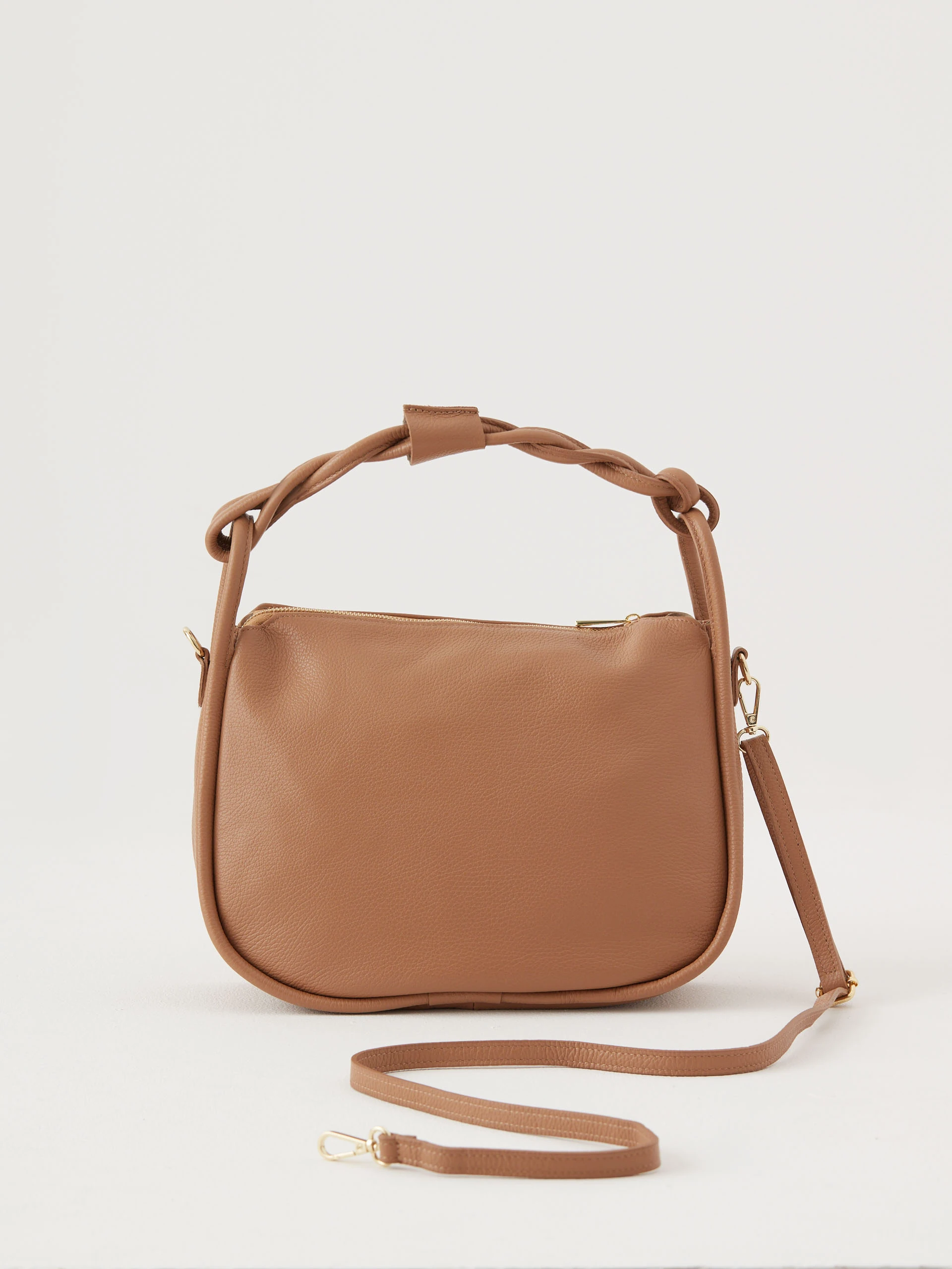 Soft beige handbag with decorative strap