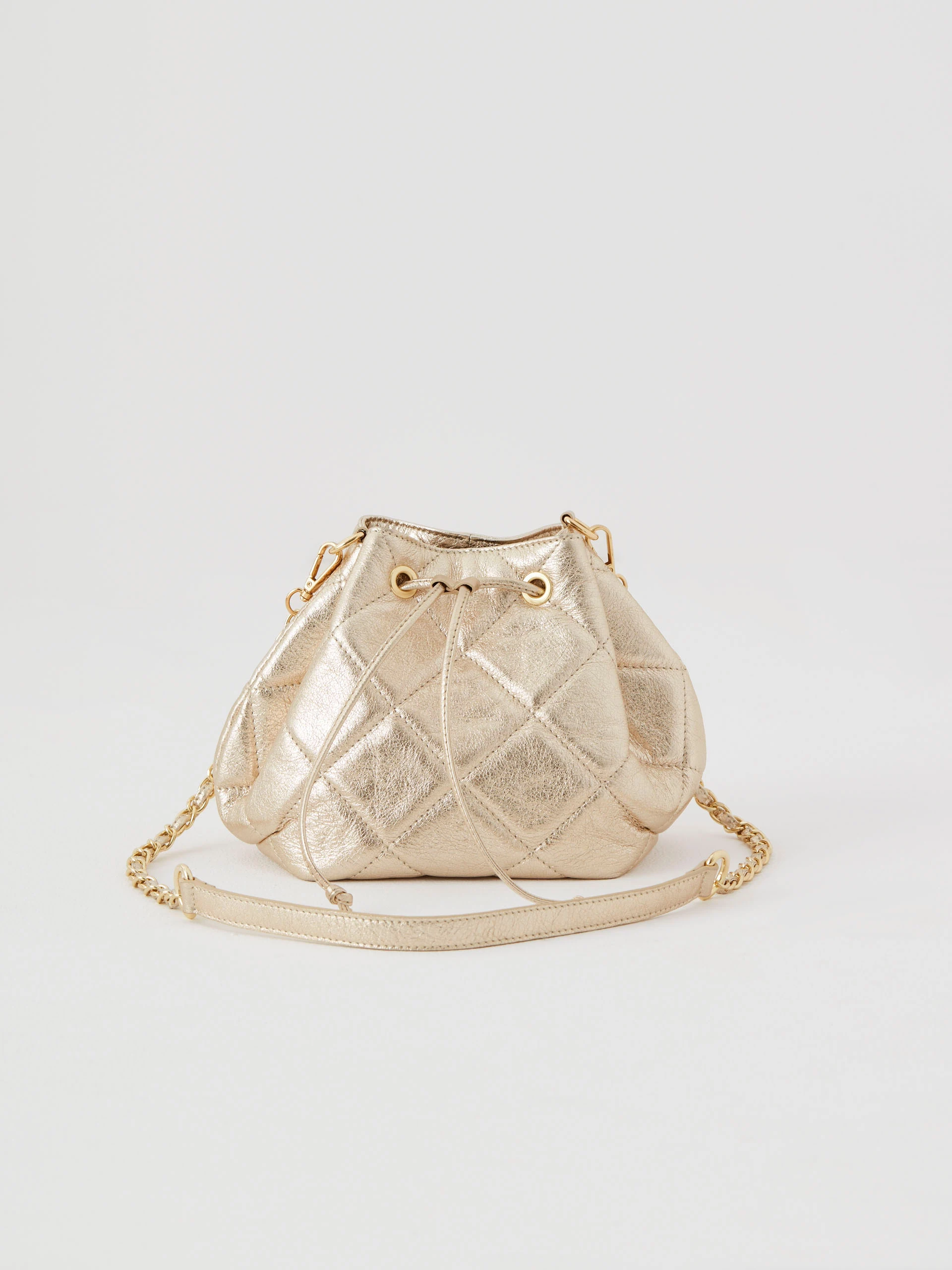 Quilted gold bucket bag