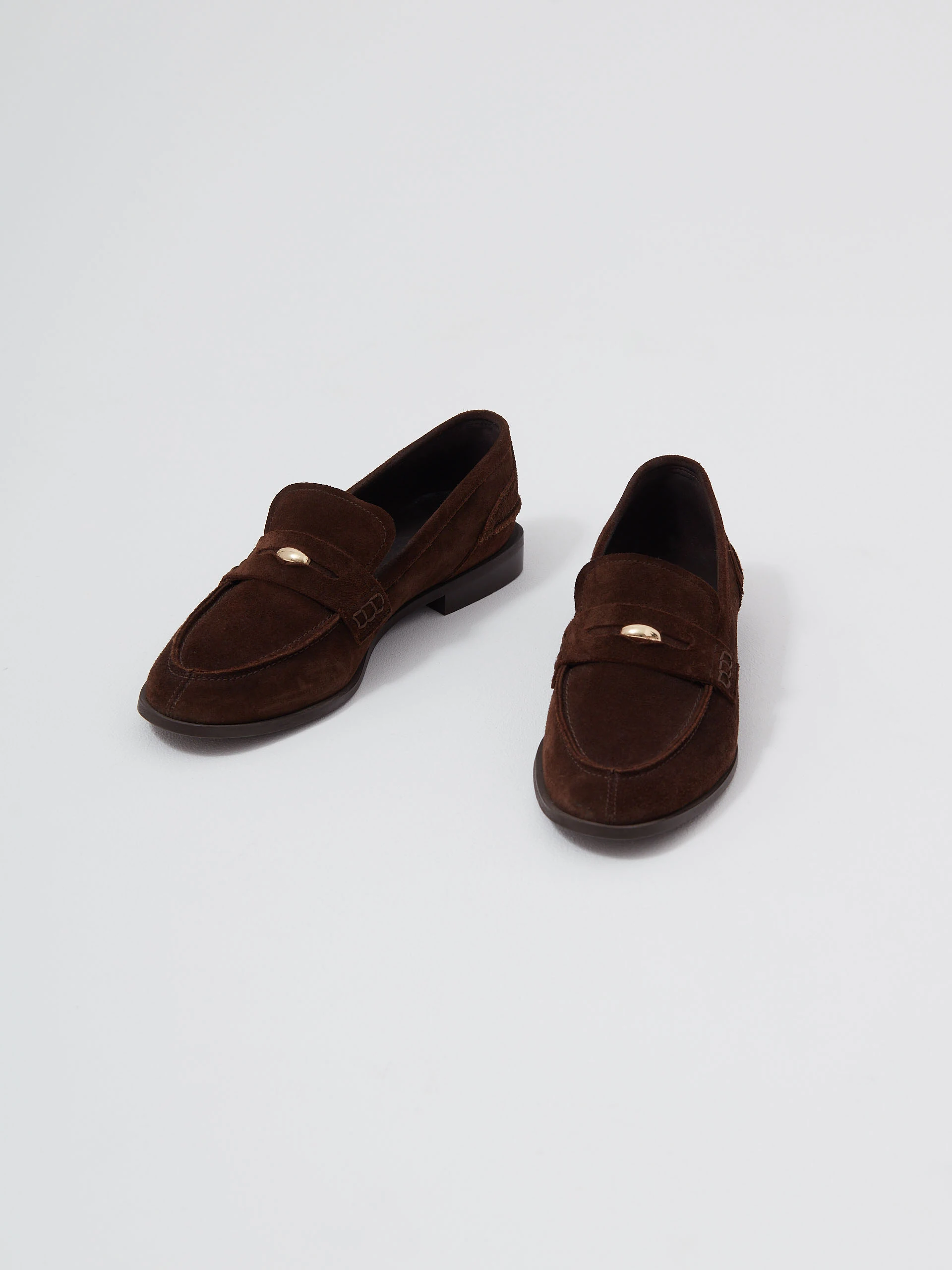 Chocolate brown moccasins made of natural leather
