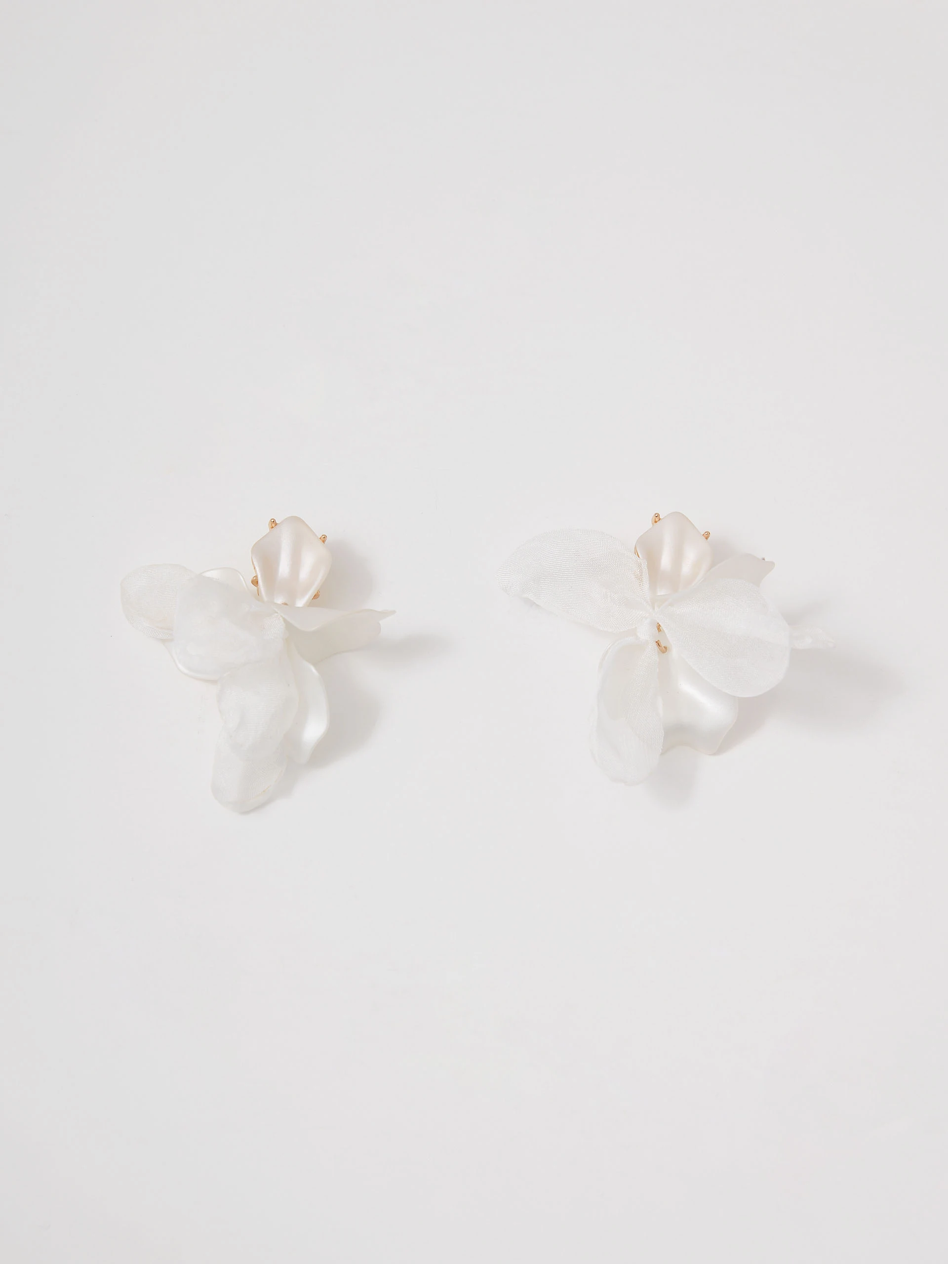 White flower-shaped earrings