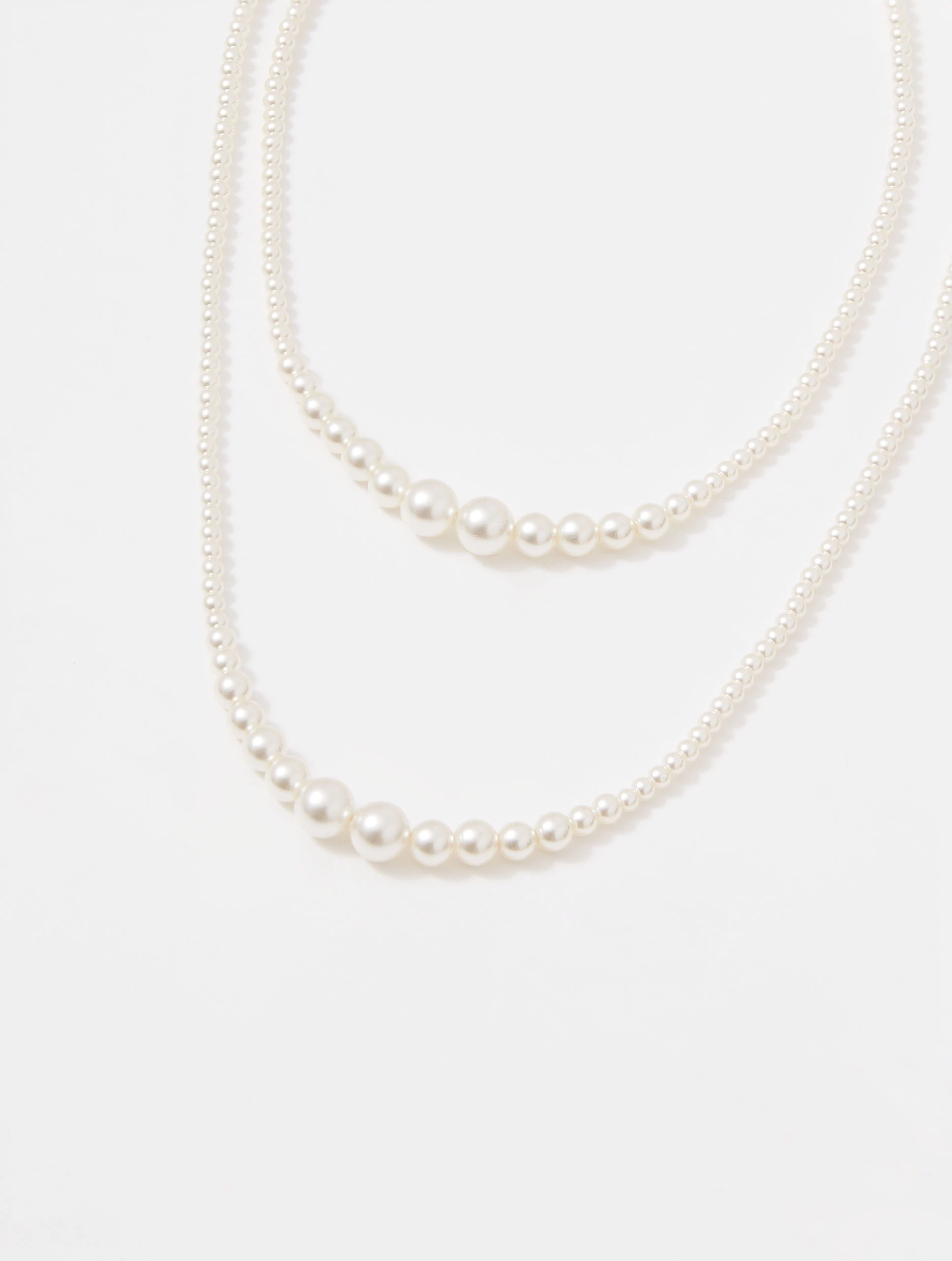 Long pearl bead necklace