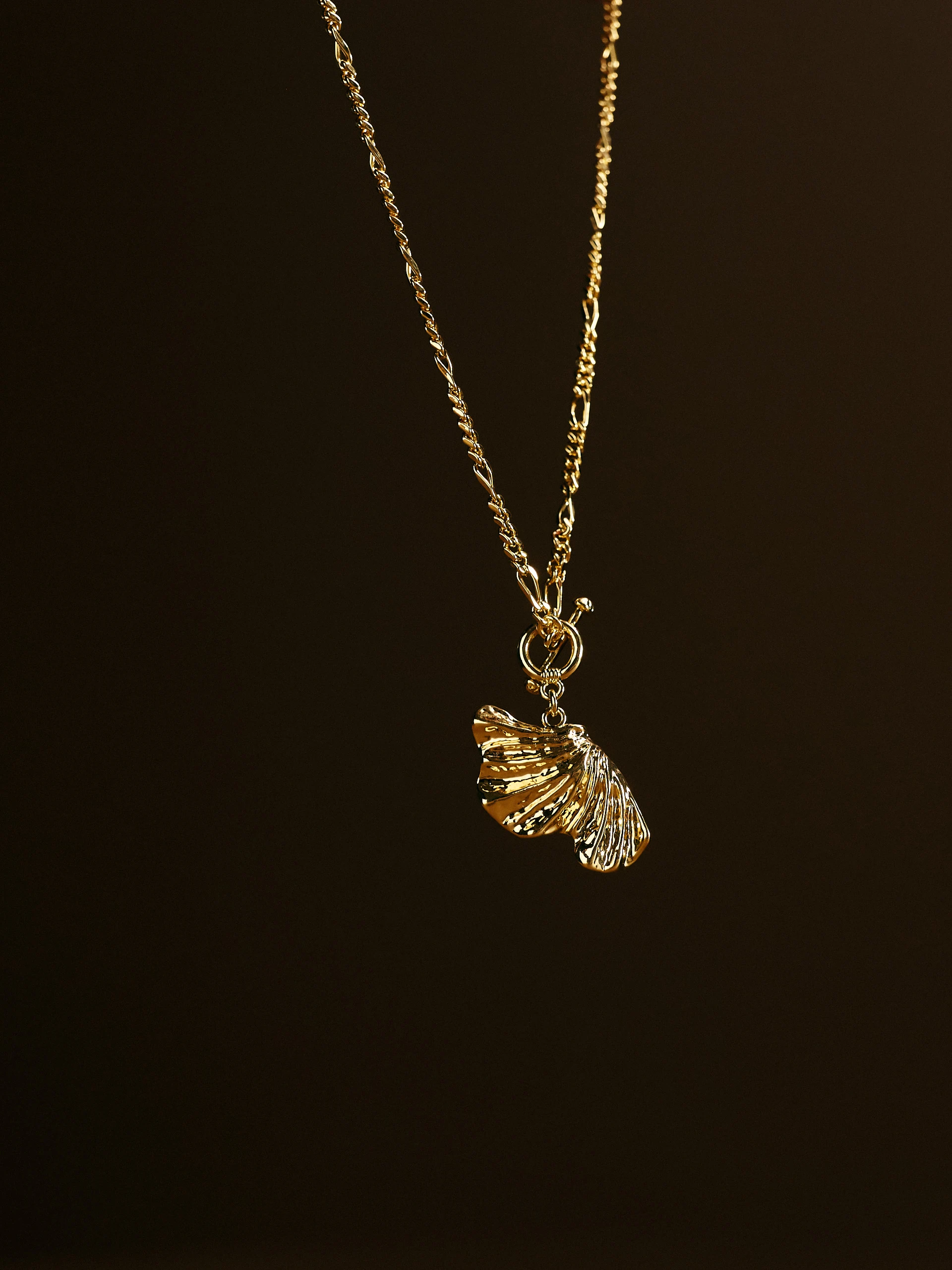 Gold-plated necklace with pendant on a thick chain