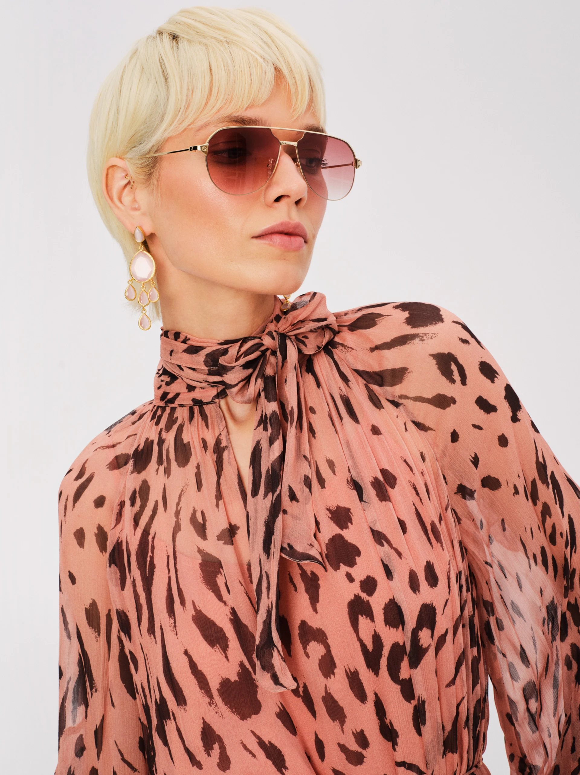 Gold-colored sunglasses