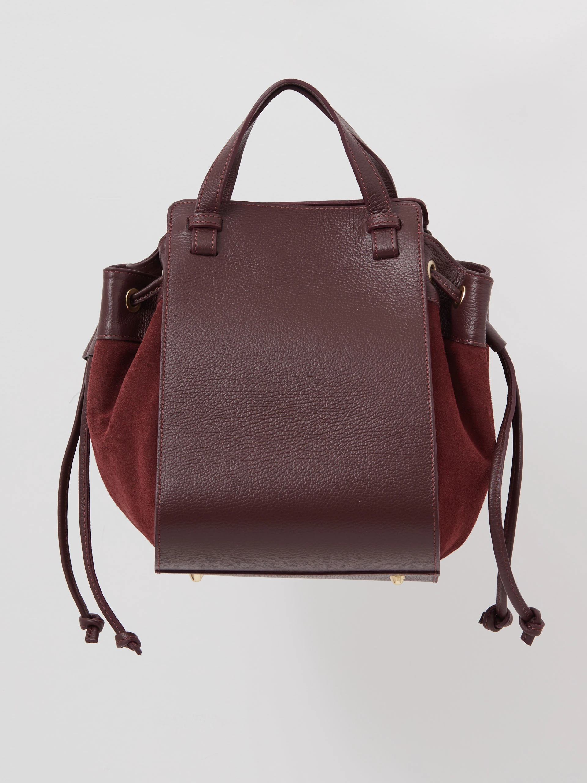 Burgundy leather handbag made of mixed materials