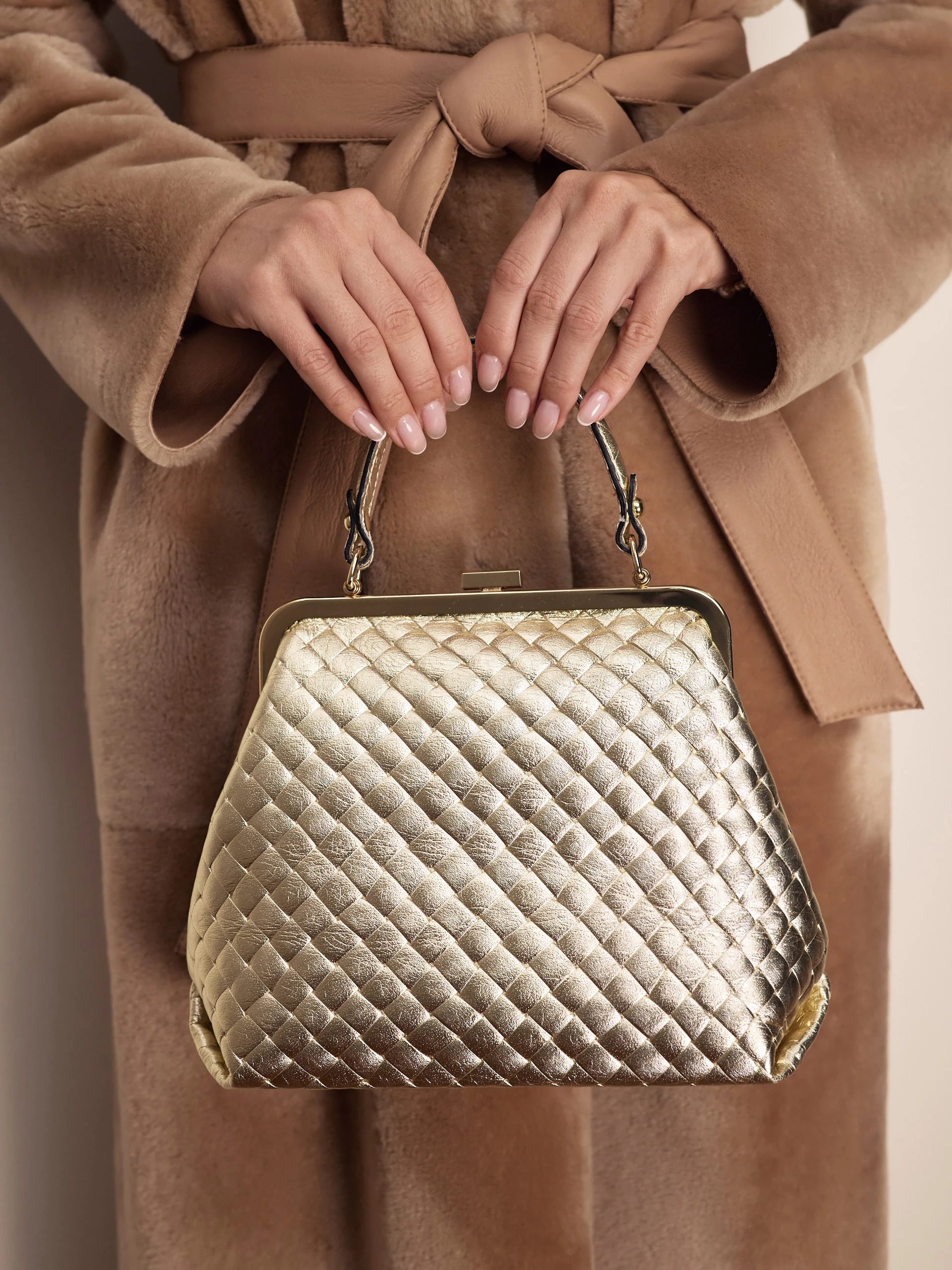 Gold quilted genuine leather handbag
