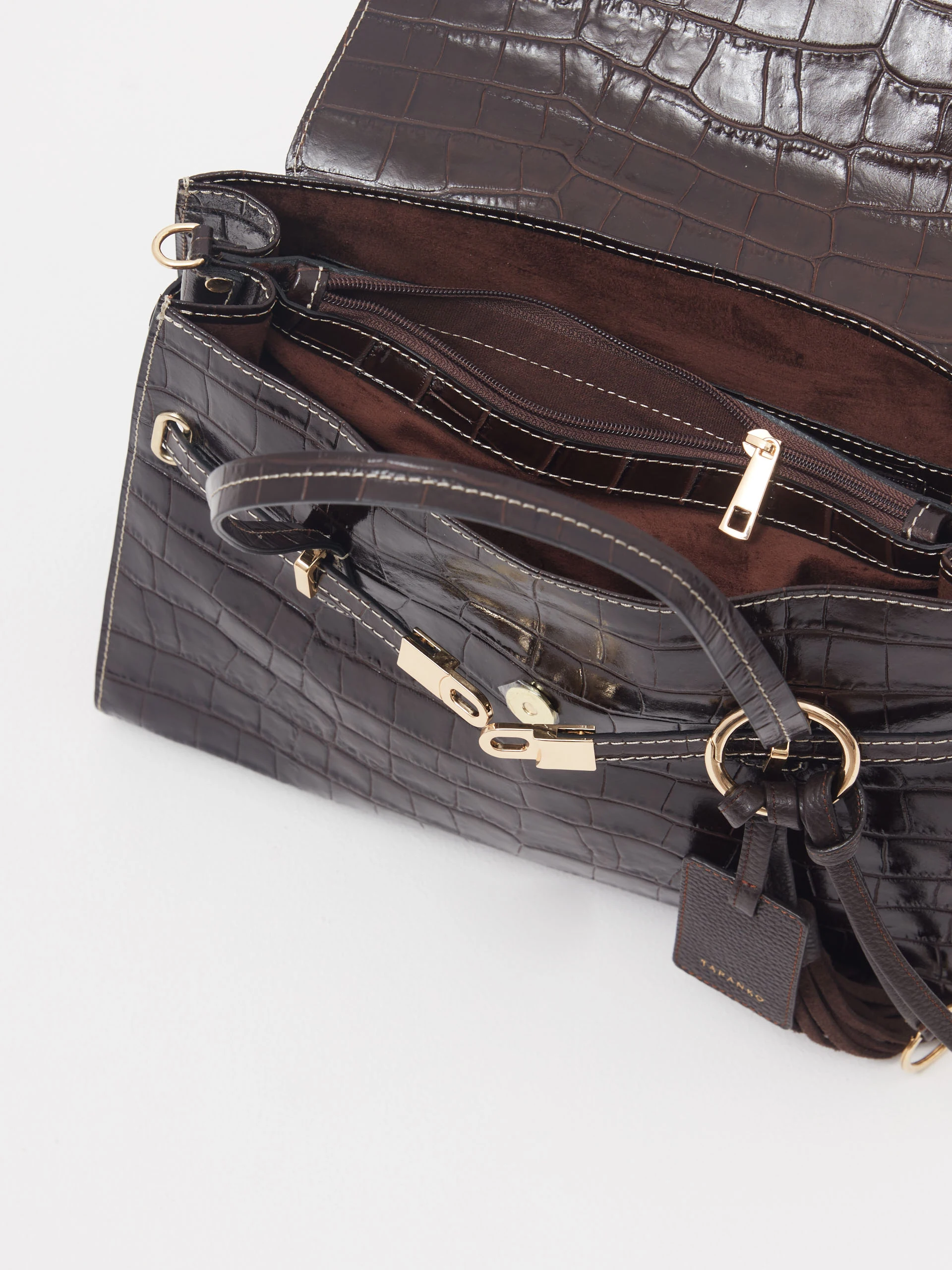 Chocolate leather bag with animal print