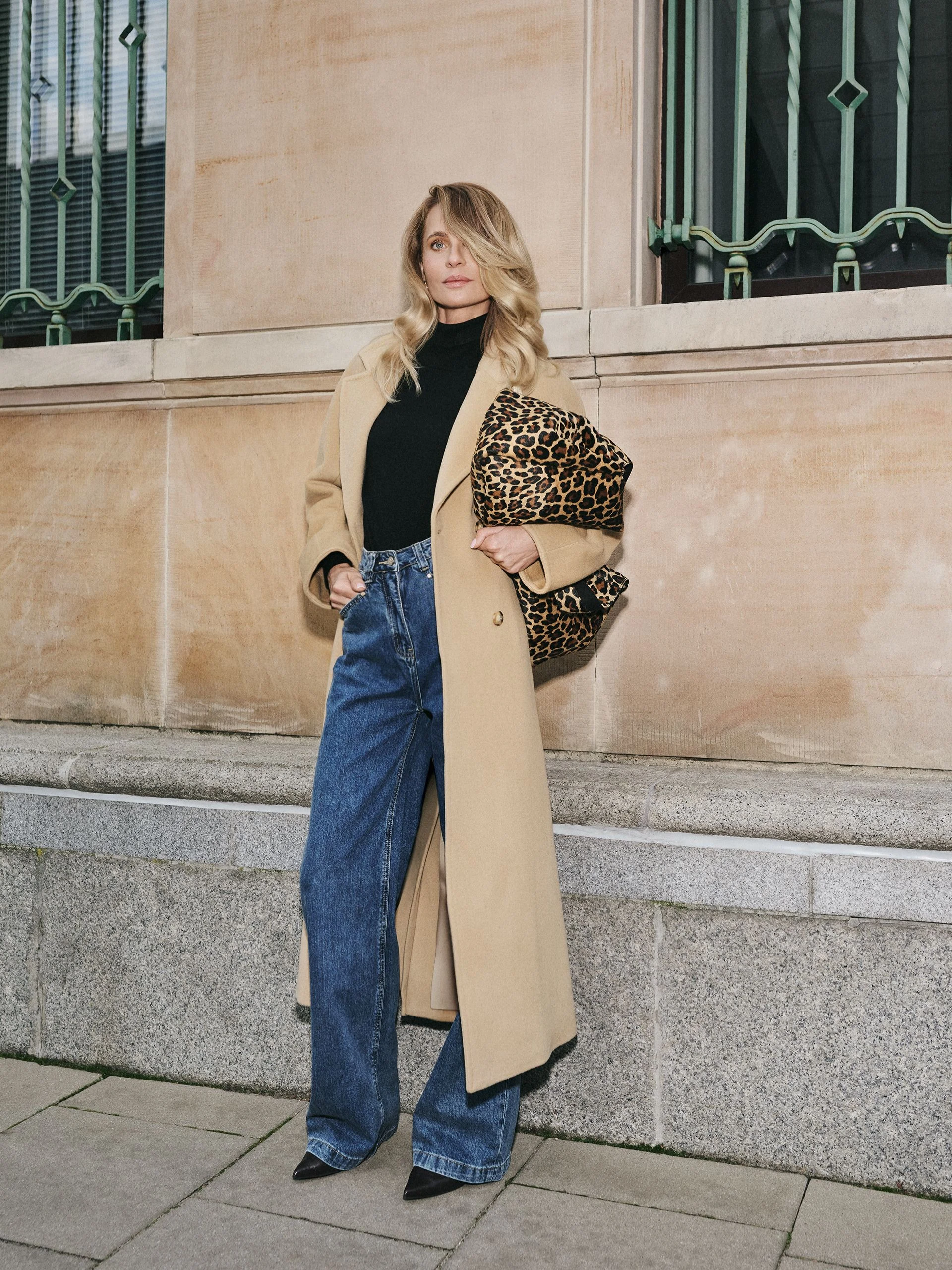 Leather handbag with a leopard print and fur texture