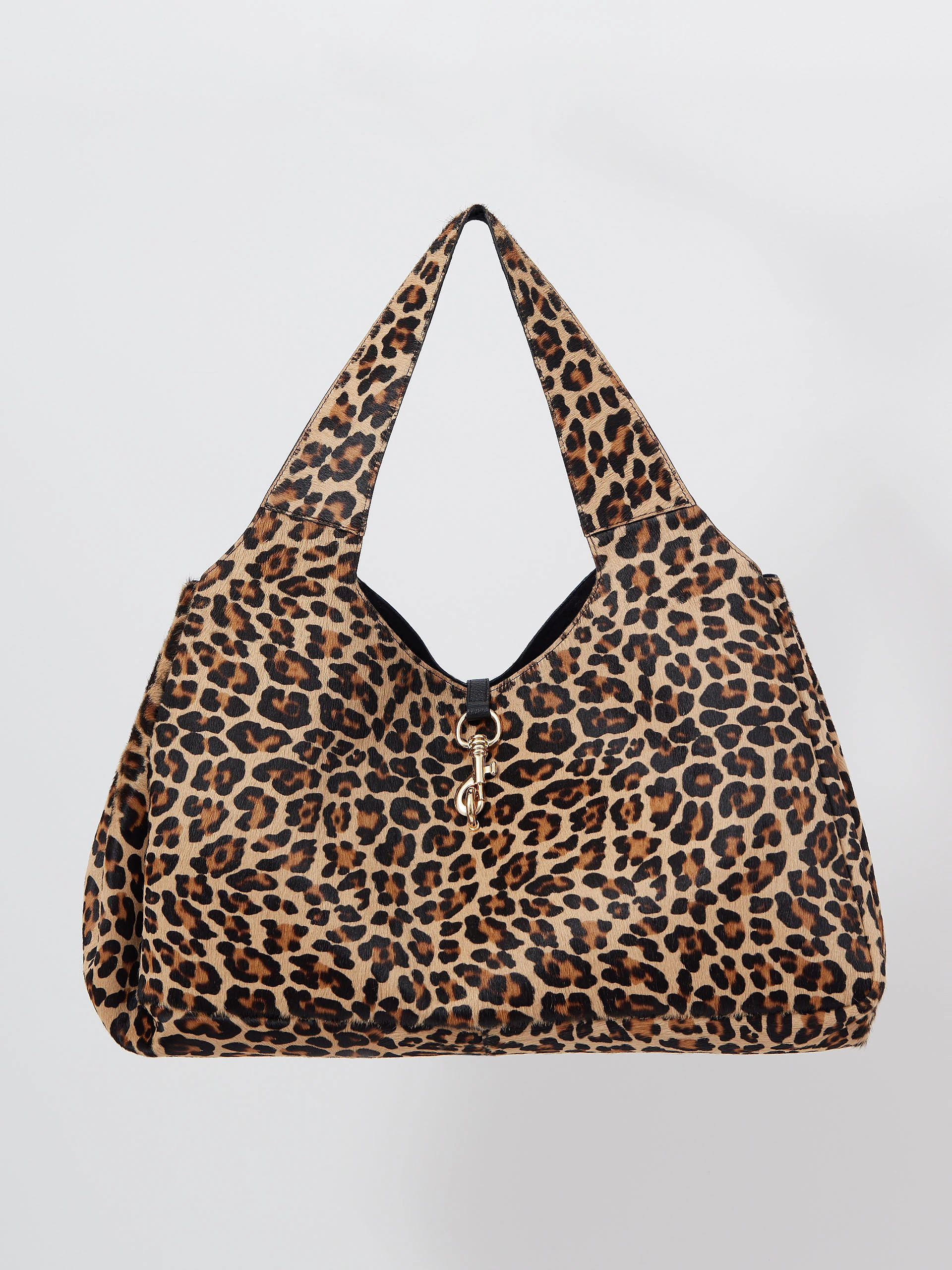 Leather handbag with a leopard print and fur texture