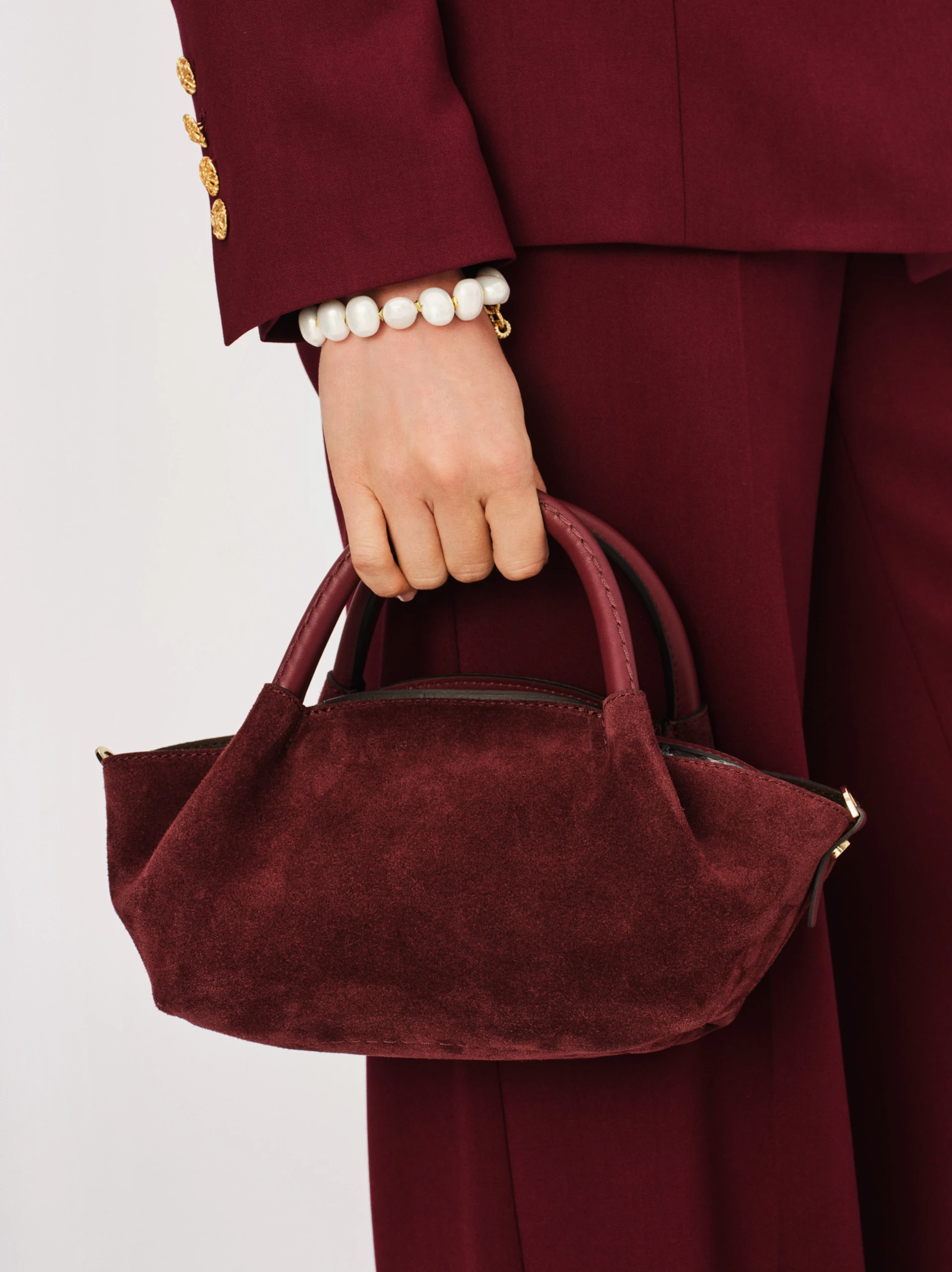 Suede handbag in burgundy