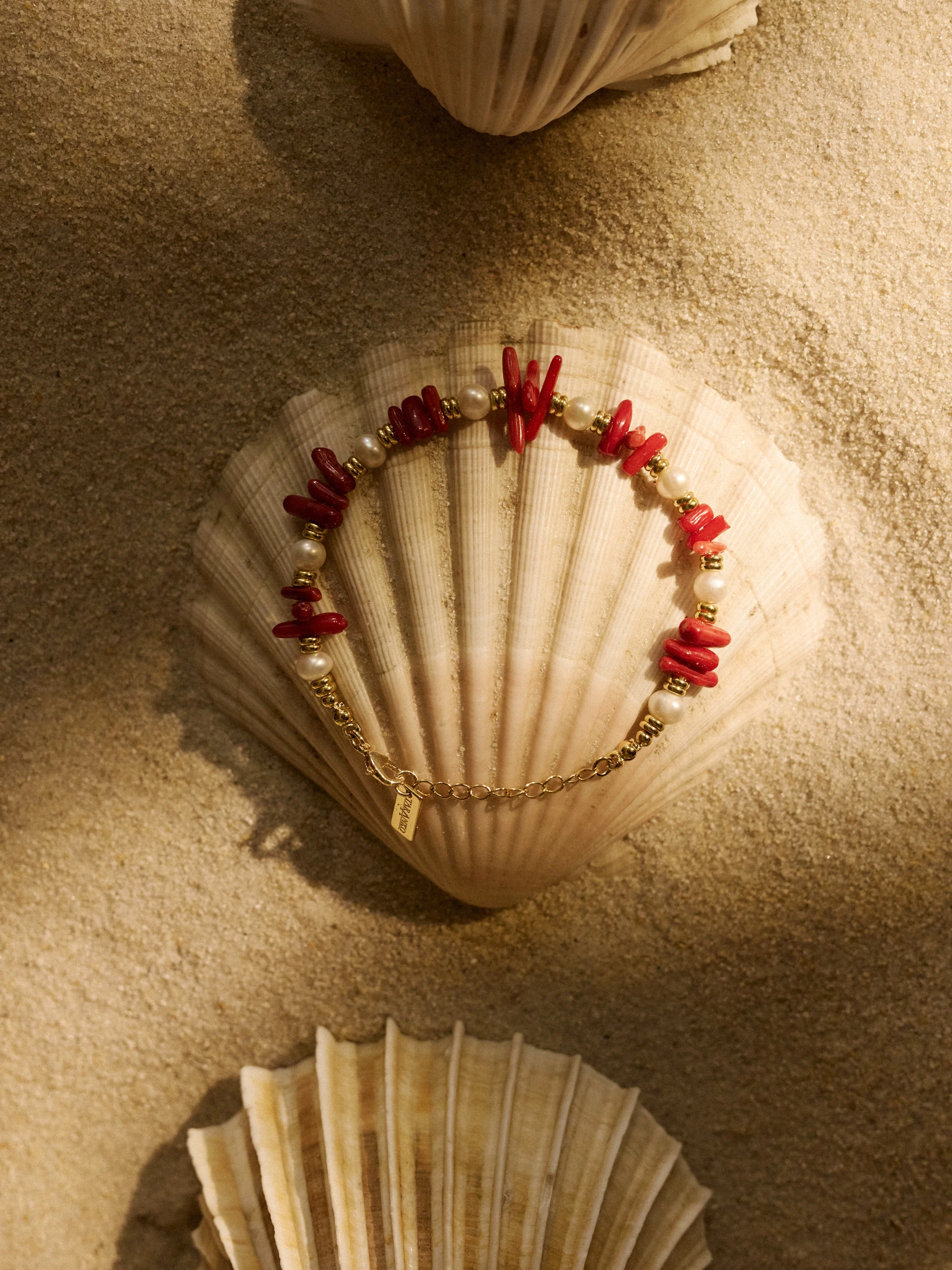 Gold-plated bracelet with pearls and red beads