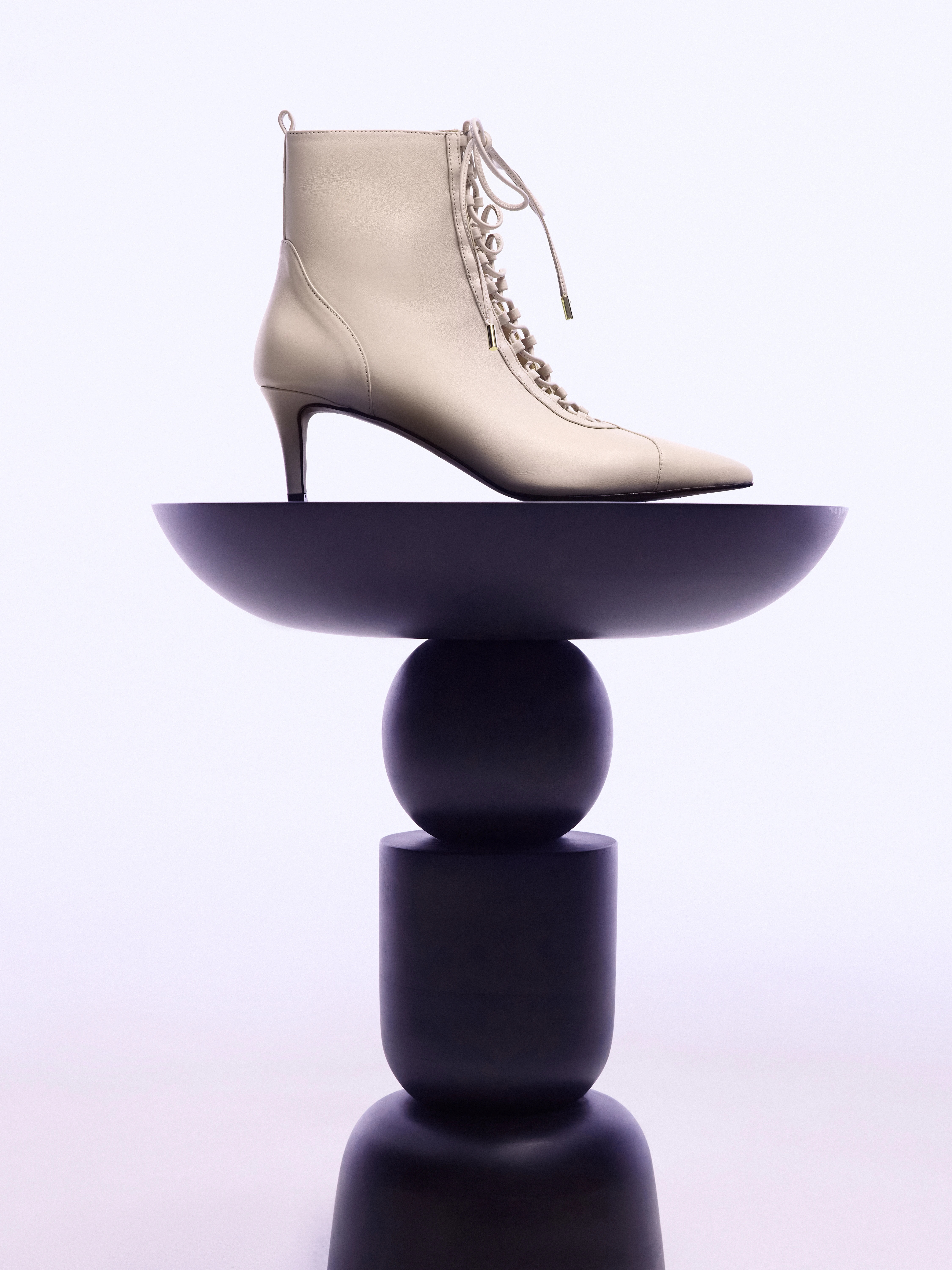 Beige heeled ankle boots made of genuine leather