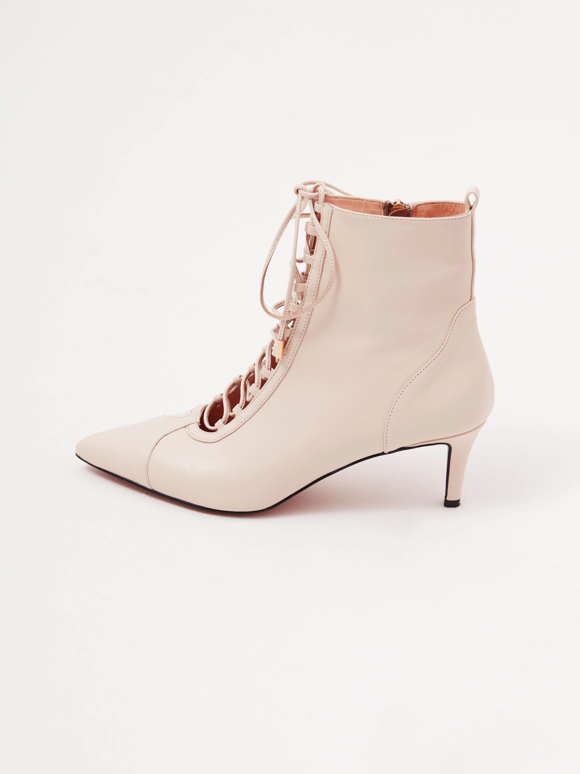 Beige heeled ankle boots made of genuine leather
