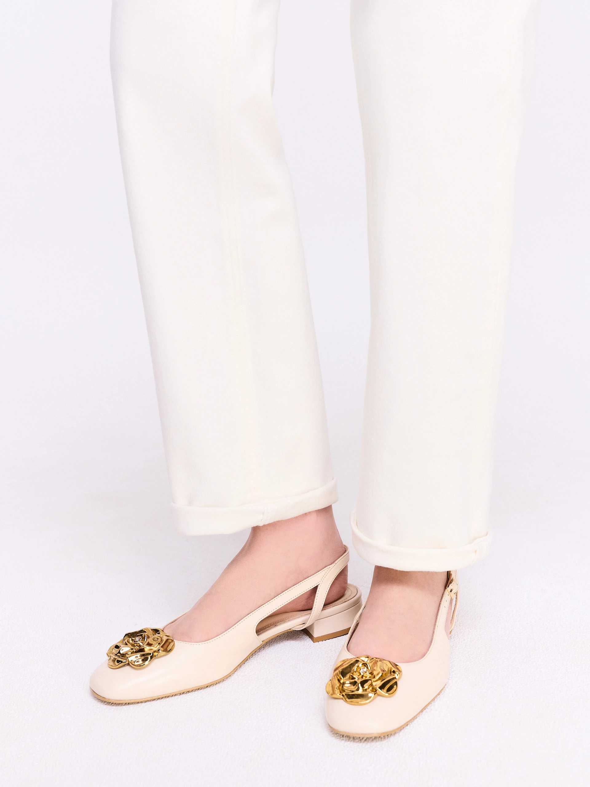 Leather ballerina flats with decorative flowers