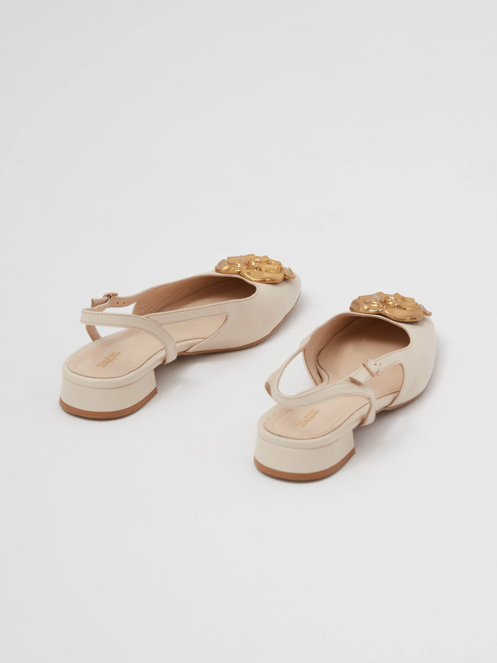 Leather ballerina flats with decorative flowers