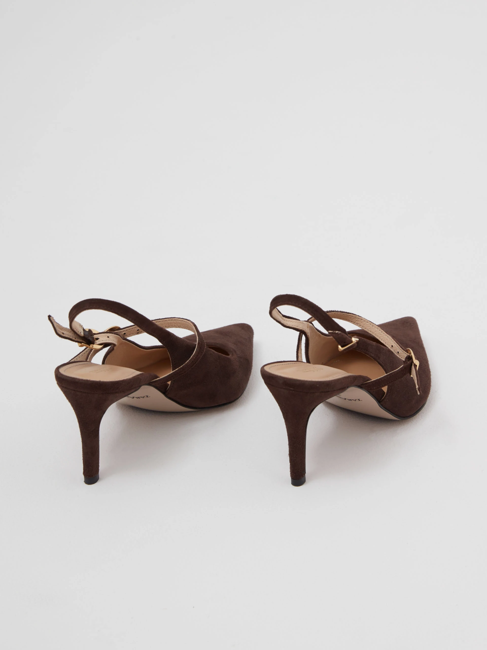 Brown leather pumps