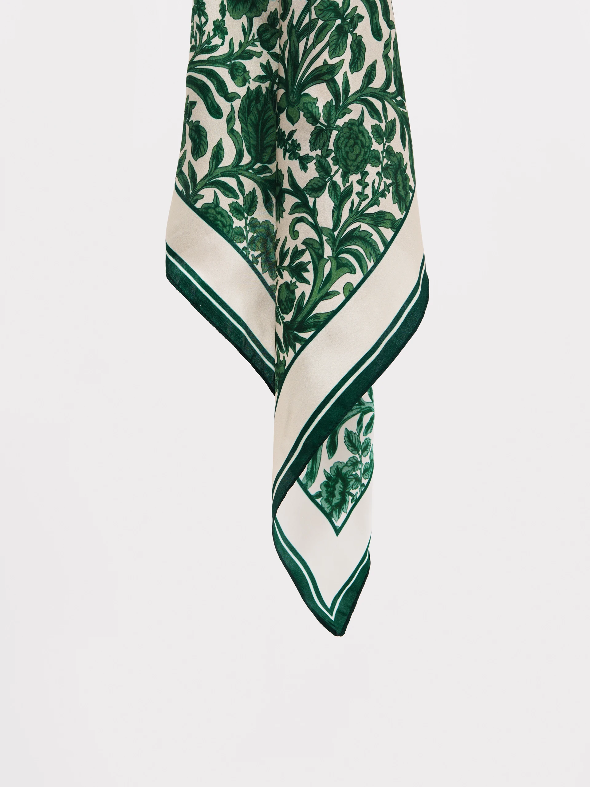 An elegant silk blouse with a floral print
