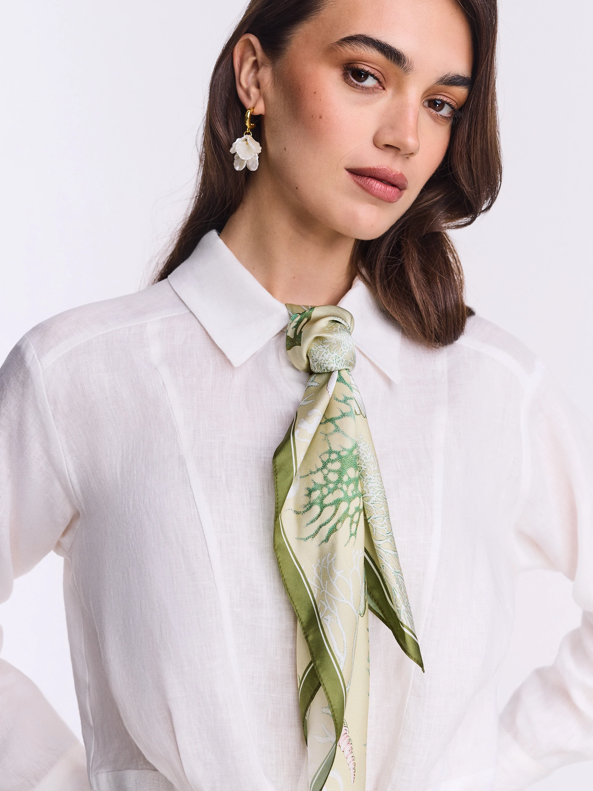 Gold-plated shell earrings