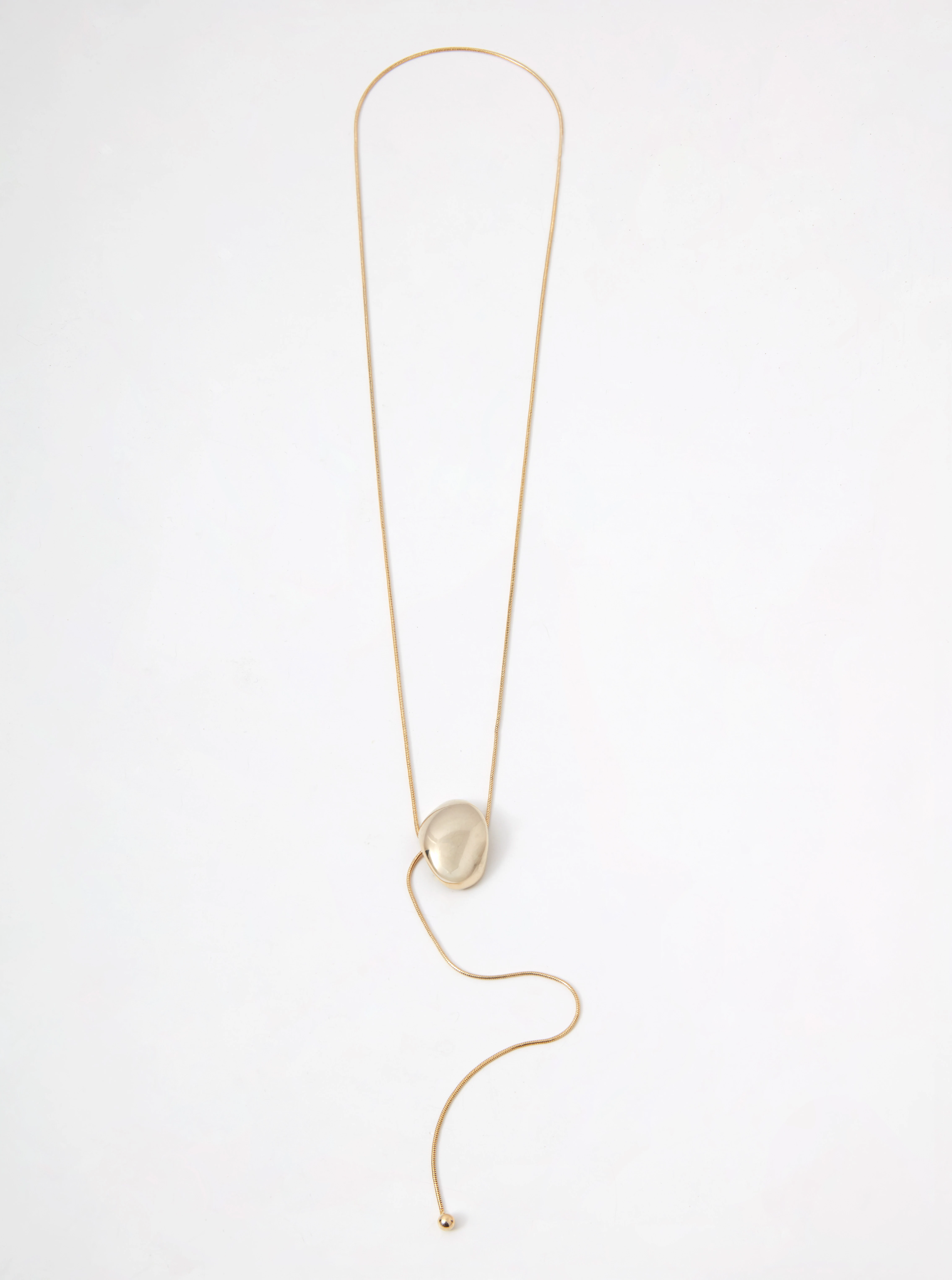 A gold-colored necklace with a pendant and a clasp