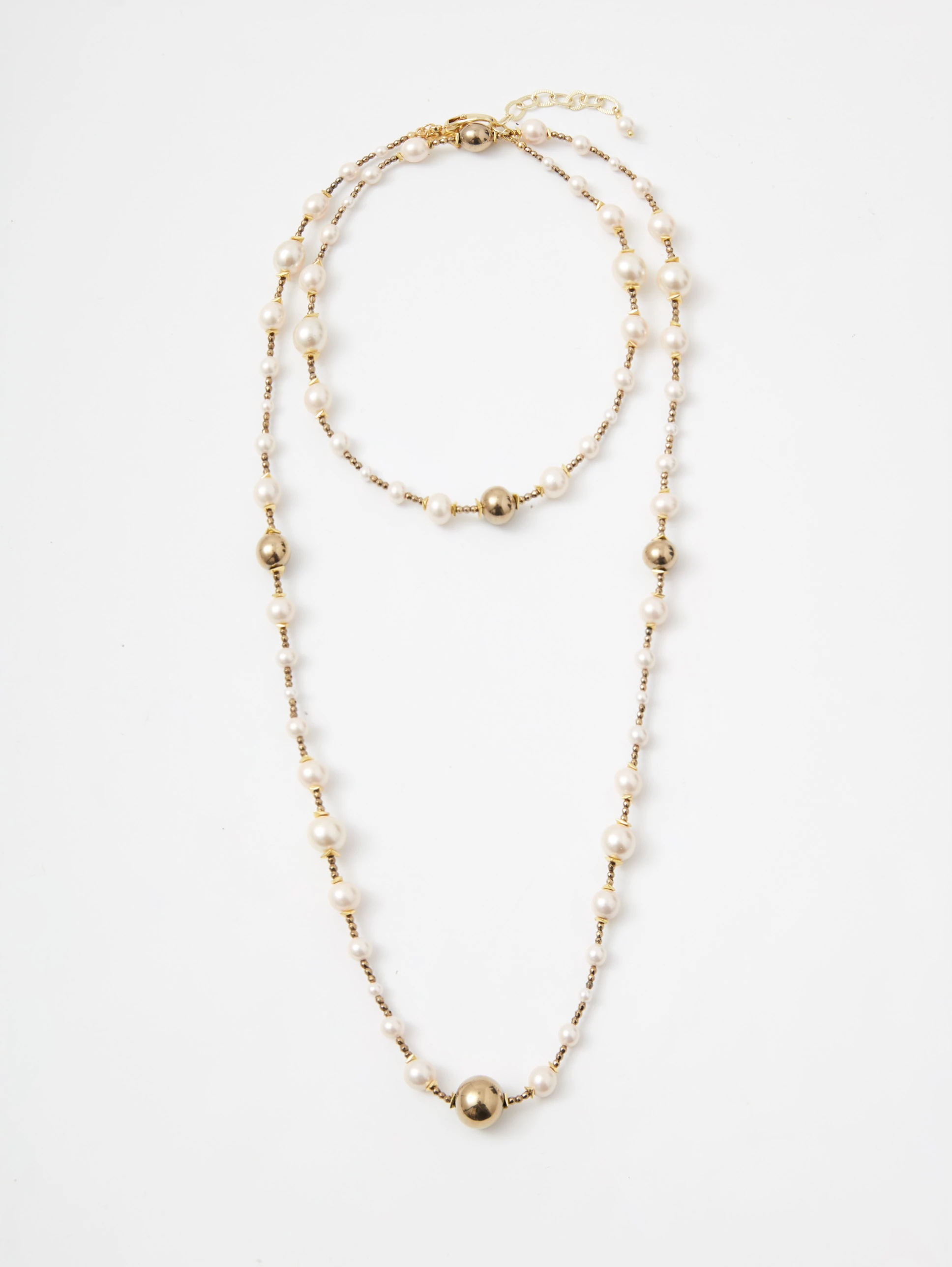 Long necklace made of natural pearls and hematite